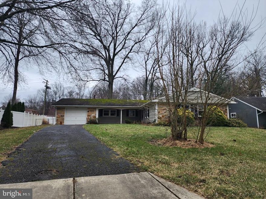 Spacious 1-level rancher w 3 bedrooms, 2 bathrooms, large living room w/recessed lights, crown molding,  kitchen with table space, slider leading to the fenced back yard with a patio, family room, and garage converted to a bonus room. Close to shopping, restaurants, and schools. SOLD AS-IS