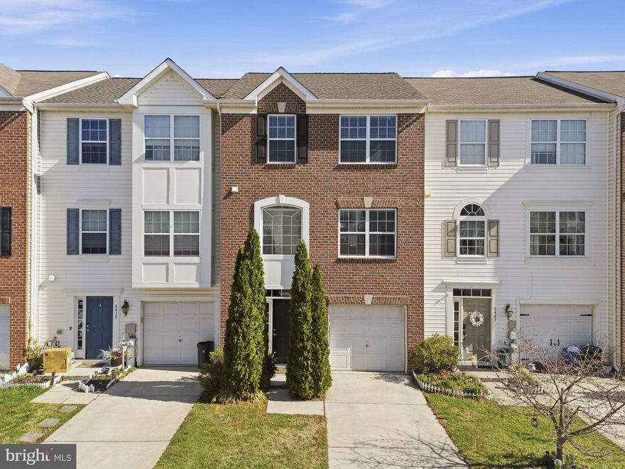 This move-in ready townhome offers three levels of comfortable and versatile living with 3 bedrooms, 2.5 bathrooms, and a garage. The entry level welcomes you with a bright foyer and a family room. This level also offers convenient interior access to the garage.

The main living level is designed for everyday living and effortless entertaining. The open floor plan centers around a spacious kitchen featuring a large island with breakfast bar, ample cabinetry, hardwood floors, and generous counter space. The kitchen flows seamlessly into the dining area and expansive living room, creating an inviting space for gathering. A convenient half bath completes this level.

The upper level provides a peaceful retreat with a private primary suite offering a walk-in closet and en-suite bath. Two additional bedrooms and a full hallway bath provide comfortable space for family or guests.

Ideally located just minutes from major highways, shopping, and dining, this home also offers access to community amenities including beach area, a dog park, and local favorites like the Hard Yacht Café.