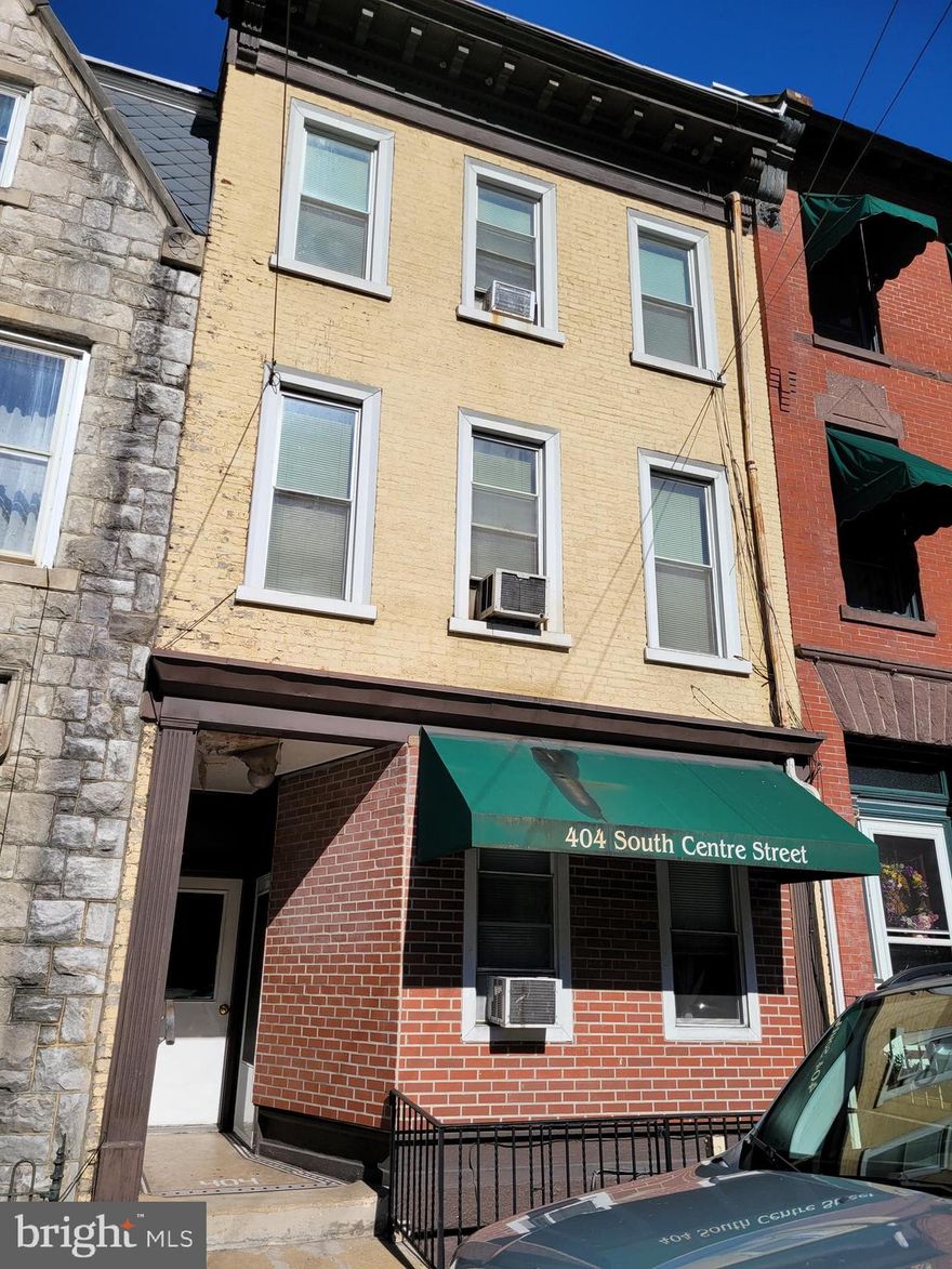 Fully rented building.  Four units, three units with one bedroom at $480. each.  Basement unit is one bedroom, with off street parking, at $525.   All units electric heat.  Selling as is