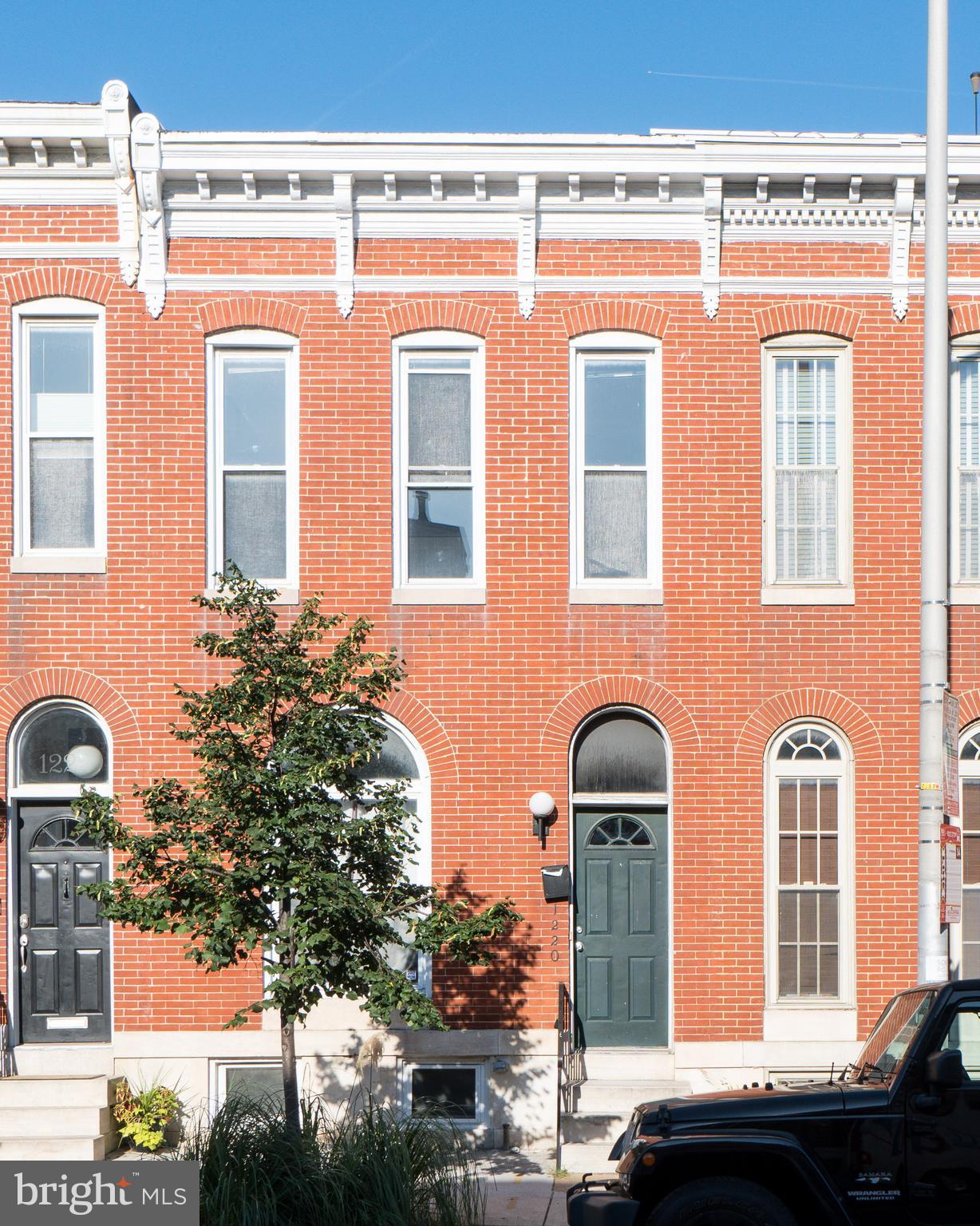 GREAT Opportunity and VALUE. Fantastic square footage in this lovely spacious Federal Hill Home WITH HIGH CEILINGS. Beautiful hardwood floors throughout first floor with 2 decorative fireplaces. Updated kitchen and bathrooms. Large living room and separate dining room. Mud room off the kitchen with room for storage. Freshly painted and new carpet in the bedrooms with great natural light. Deck off the back with PARKING pad. Square footage is 1716