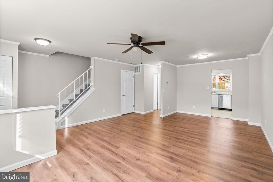Welcome to this beautifully updated townhome in Glen Burnie! Freshly painted from top to bottom, this home features LVP flooring throughout the entryway, living room, and dining room, creating a clean and modern feel. The updated kitchen boasts white cabinetry, stainless steel appliances, tile flooring, and a breakfast area with a sliding glass door leading to the deck and fully fenced backyard—perfect for relaxing or entertaining. Upstairs you’ll find 4 spacious bedrooms with brand new carpet, including a primary suite with a private full bath and an additional hall bath. The finished lower level provides even more living space with a large rec room, tile flooring, laundry area, utility closet, and a convenient walk-up to the backyard. Plenty of parking is available in the community lot for you and your guests. This MOVE-IN READY home combines modern updates with functional design—ready for you to make it your own!