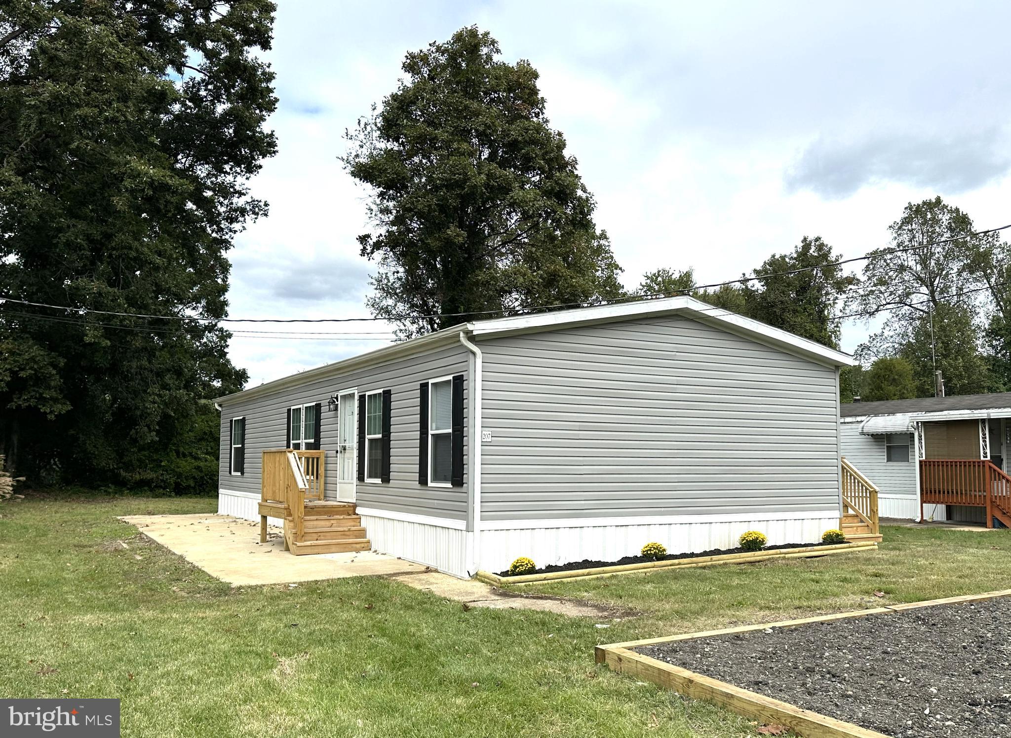 Great Arnold Location! Beautiful Double Wide in Sought After 55+ Dogwood Mobile Home Park! Over 1500 square feet of Finished Living Spave with Four Bedrooms and 2 Full Bathrooms. Open Floor Plan with Luxury Vinyl Plank Flooring Throughout Main Living Area. Large Eatin Kitchen with New Kitchen Cabinets, Updated Stainless Appliances and Big Walkin Pantry. The 4 Bedrooms are all Nice in Size with a Large Primary Bedroom, Private Bathroom with Soaking Tub, His and Her Vanity and Big Walkin Closet. Home sits on Nice Lot with Custom Sundeck, Front Porch, Big Patio and Oversized 4 Car Driveway. Close to Shopping and Restaurants. Minutes to Rt 50 and Downtown Annapolis. Come have a look, this Beauty won't Last!