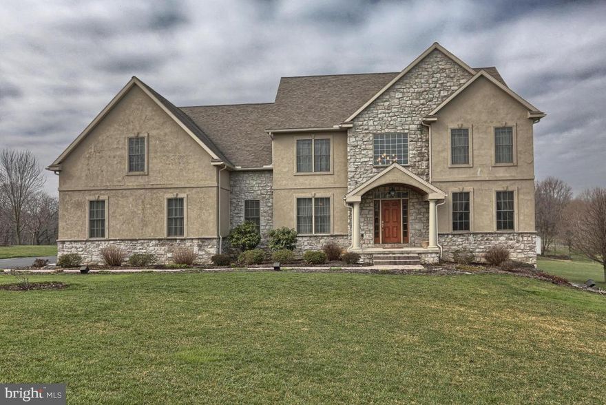 5 bedroom home on over 2 acre county setting lot in Millersville. Eat in granite kitchen with island & breakfast bar, 2 story family room with stone surround gas fireplace & first floor office & bedroom. Master suite with huge master bath with whirlpool tub & master bath. Finished daylight lower level with 9 foot ceilings & superior walls.  Maintenance free screened in porch and rear deck lead to backyard with 480 sf storage shed & fire pit.