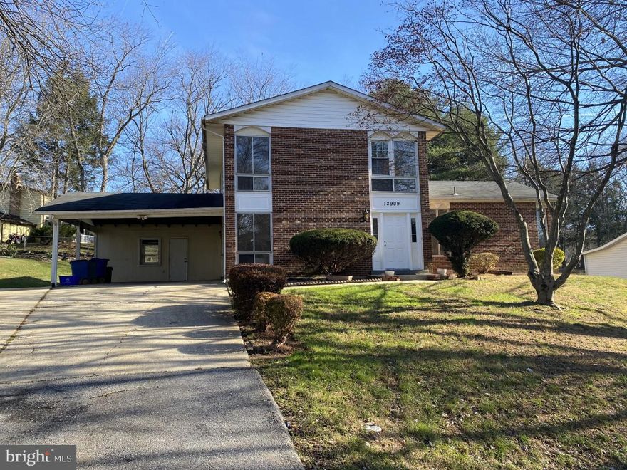 Lovely 4 Level 5 Bedroom and 3 Full Baths Single Family Home with a Carport, Large Driveway and Storage Shed. Kitchen offers ceramic tile design next to the separate Dining Room. Spacious Family Room with brand-new hardwood floors and wood-burning fireplace, in which walks out to the entertaining patio with the large backyard with a small awning. Big, Sun-filled Living Room with refinished hardwood floors. Master Suite with 3 Closets and Private Master Bath. Plenty ample space with shelving in the unfinished basement where the laundry /utility room is located. New Washer and Dryer. Freshly painted walls. Close to Shopping, Transportation, MD-200, and 495.