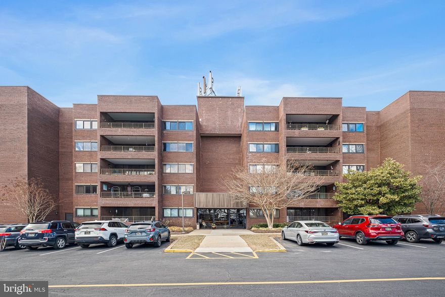Move in condition!  Located in the long running premier community of Coffee Run this 5th floor end unit with 9 ft ceilings is located in a private end-of-the-hall location and offers amazing views with one floor living and is virtually maintenance free.  The building offers secure entry and has a nicely furnished waiting area.  Some recent updates in the unit include just installed new flooring...from tile in the entry and through the kitchen, to the brand new wall-to-wall carpeting in the rest of the condo and fresh paint neutral throughout.  Master bedroom features two closets...a walk-in closet and a second closet, plus a wall of cabinets under the windows for abundant storage.  The master bath has been remodeled with double sinks, a large walk-in shower with a stationary shower head and a removable shower head along with seating and grab bars.  This home offers an open floor plan with an expansive living/dining room featuring a wall of glass sliders opening to a 21' x 10' balcony.   A large eat-in-kitchen with lots of cabinets, recessed lighting, under the cabinet lighting, double oven, microwave, refrigerator and dishwasher stainless steel double sink and pass through to dining/living room.  The second bedroom also features a wall of cabinets for extra storage.  The den has built-ins and lovely grass cloth wallpaper. There is a utility storage closet located near the unit and a basement storage unit. The Condo Fee covers heat, hot water, water, trash/recycle, Comcast preferred for TV, heat pump repairs, pool and common area maintenance and landscaping as well as pest control in common areas.  Residents is responsible for sewer bill and thermostat replacement.   Coffee Run is conveniently located near the heart of Hockessin, which gives the buyer easy access to a variety of shopping, dining and entertainment options.    Coffee Run charges buyers an Initial Assessment of $700 at time of settlement.
