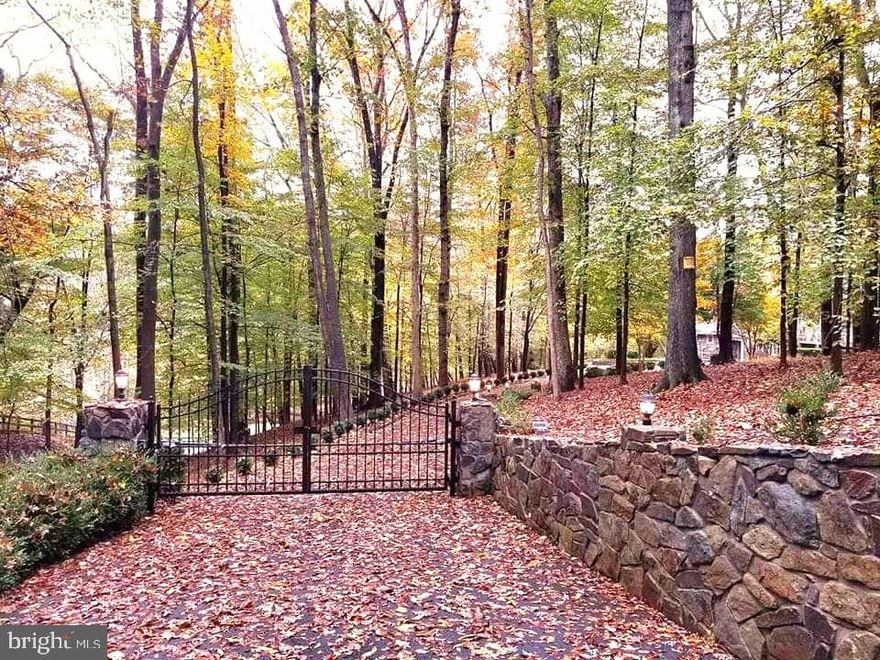 This property comes with a house as is, which the buyer can keep or build a new one at their discretion. 
The listing is for the land parcel only. Location, location, location! This unique land with a beautiful curb 
appeal is located at the end of a private road. The 5.09 lush acre site includes over 1,000 feet of beautiful 
stream, a private park setting with two gates, surrounded by natural wildlife and is within a 5-minute walk to 
Potomac River. This rare property with a majestic view of the stream is located in one of the most sought 
after real estate locations. It also has a septic tank, well and 5 storage sheds. The charming and quaint 
Great Falls Village is less than 2 miles away which offers shops and restaurants for your convenience. This 
fabulous private property is a short drive to Reston, Tysons Corner, Washington Dulles International 
Airport, Reagan National Airport, and downtown Washington, DC.