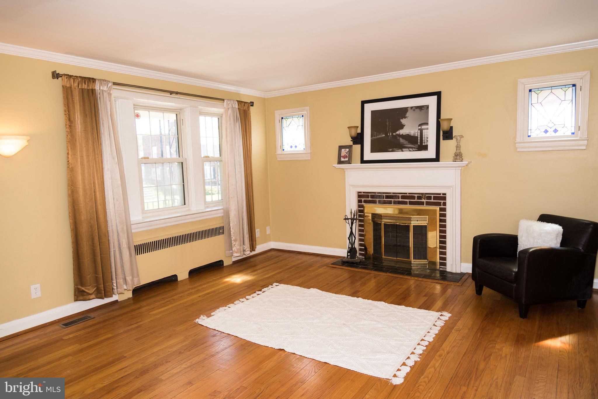 MULTIPLE OFFERS-HIGHEST AND BEST DUE 9/12/19 3PM---2 Fireplaces- 3 levels of finished living space, attached garage and central air, fantastic sunroom with skylights and hardwood throughout-fresh upgrades throughout with beautiful tile work