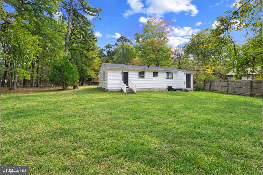 Photo of 63 Palmetto Avenue, BROWNS MILLS, NJ 08015 (MLS # NJBL2122810)