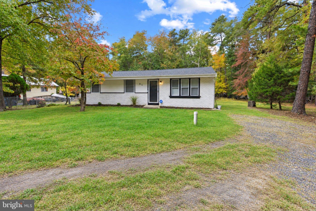 Photo of 63 Palmetto Avenue, BROWNS MILLS, NJ 08015 (MLS # NJBL2122810)