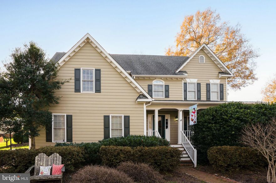 So much to love! Welcome home to 12631 Amershire Court. This charming 5-bedroom, 2.5-bath colonial is nestled on a lush and level lot on a cul-de-sac in the sought-after community of Wyndham.  This warm and inviting home features a charming front porch and a spacious deck for outdoor enjoyment, and inside you’ll appreciate the warm hardwood floors, 2-story ceilings in the family room, elegant plantation shutters, crown molding and wainscoting details, a gas fireplace and gas cooking in the eat-in kitchen with nook and bay window. Upstairs this home has beautiful vaulted ceilings in the primary bedroom with attached en suite bathroom, 3 more bedrooms on the upper level and a 5th full attic bedroom. Enjoy the space to relax and entertain. This home is a perfect blend of style and comfort and ready for its new owners to love!