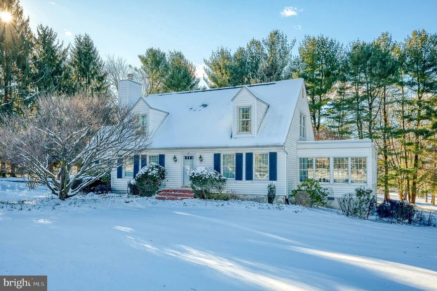 Rare opportunity to own this unique & beautiful custom-built cape-cod located on a picture-perfect court in a much desirable location!   This lovely home boasts gleaming hardwood floors throughout, family room w/WB fireplace & beamed ceiling, cozy living room, & separate dining room perfect for entertaining. The tastefully updated eat-in kitchen w/granite counters, SS appliances & pantry provides outside access to patio & beautiful back yard.  The focal point for family living will be the stunning light-filled sunroom addition which can be enjoyed year round!   Convenient laundry & powder rooms on main level.  The upper level has two spacious bedrooms, full bath, & plenty of closet & storage space.  The large unfinished basement w/high ceiling is a wide-open canvas for your imagination.  Situated on 1.18 lovely acres backing to trees & nature for the utmost privacy.  Two-car attached side-entry garage.  Tons of updates including Anderson windows, 2018 Brothers roof w/warranty, 2023 Blue Dot heat pump system, 2021 water heater, Culligan water treatment system.  Lovingly maintained by original owners - must see!