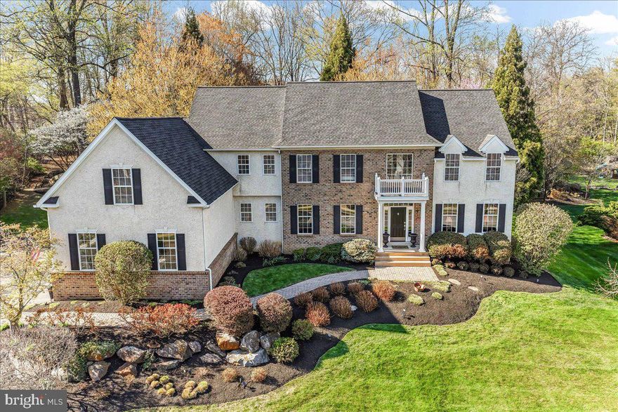 Spectacular updated 5 bedroom, 3 full bath, 2 half bath Kirkwood Glen center hall Colonial; nestled on a premium .74 acre private lot; one of the deepest most functional lots in the community featuring a lovely tree lined park like backyard for privacy, with lots of lush landscaping and beautiful gardens; a fire pit pad with lots of seating (Adirondack Chairs are included), and a picnic table pad (Picnic Table Included) as well as lots of outdoor lighting; perfect for large gatherings, situated in the heart of Garnet Valley and top rated Garnet Valley schools. A beautiful updated meandering paver front walkway and flower/shrub beds flank a grand brick facade, with a charming portico that greets you at the main front entrance. As you walk into a breathtaking entrance hall with a beautiful turned staircase, you're greeted by endless upgrades & high quality finishes including custom millwork, beautiful dark wood floors that flow throughout the main level of a lovely open floor plan, 10' ceilings and much more. This fantastic home is only available due to downsizing. The luxurious master suite is exceptionally grand & spacious; featuring a vaulted ceiling, a sitting area, two walk-in closets, and a fabulous updated tiled en-suite master bath with a large soaking tub, an oversized walk in rainfall shower, his & her vanities and a separate water closet area. There are 4 additional spacious bedrooms, and two additional full bathrooms on the upper level; including a princess suite with its own bathroom.  For added convenience, the laundry room is also situated on the upper level. The main level living area features a spacious family room with a cozy fireplace and is adjacent to the exquisite updated gourmet kitchen that has lots of beautiful high end 42" cabinetry, a oversized center island, a convenient butlers pantry, storage pantry, stainless appliances including double ovens, dishwasher, cooktop, range hood and refrigerator, lovely quartz counters, pot filler, tile backsplash, and a beautiful sunny breakfast room that walks out to a fantastic deck looking out over the tranquil, private, park like rear yard flanked by trees and lots of lush gardens. Also adjacent to the kitchen is a grand formal dining room with crown moulding and chair rail. Across the center hall from the dining room is a large living room with crown moulding that is set up as a gathering / social room, and there is a spacious private office with lovely built in's, as well as two conveniently situated updated half baths. Also off the kitchen is access to a spacious garage for three cars and all your toys, The dry basement has high ceilings should you desire to finish the basement for added living or entertaining space. Centrally located to the Garnet Valley School Campus, the Concord Township Park, walking & running trails, dog parks, Rachel Kohl Library the Brandywine Youth Club sports fields & field house, dance studios, Darlington Arts Center, & all commuting routes to corporate centers, Delaware tax free shopping, airports, Philadelphia, Wilmington, Media, West Chester & more. This exceptional well maintained home has is turn-key move in ready and perfect for the family looking to move right in and enjoy all that this lovely home, neighborhood and community have to offer.  Recent updates include the master bath (2026), kitchen remodel (2024) secondary baths (2024), flooring in the entire home (2024), new hot tub / spa (2022), New Roof (2021), both water heaters (2020), new HVAC (2020) and back yard landscape (2013).  Showings begin Friday April 10th; schedule a private tour or plan to visit the open house scheduled for Sunday April 12th before its too late - this is a special one-of-a kind home and will not last !!