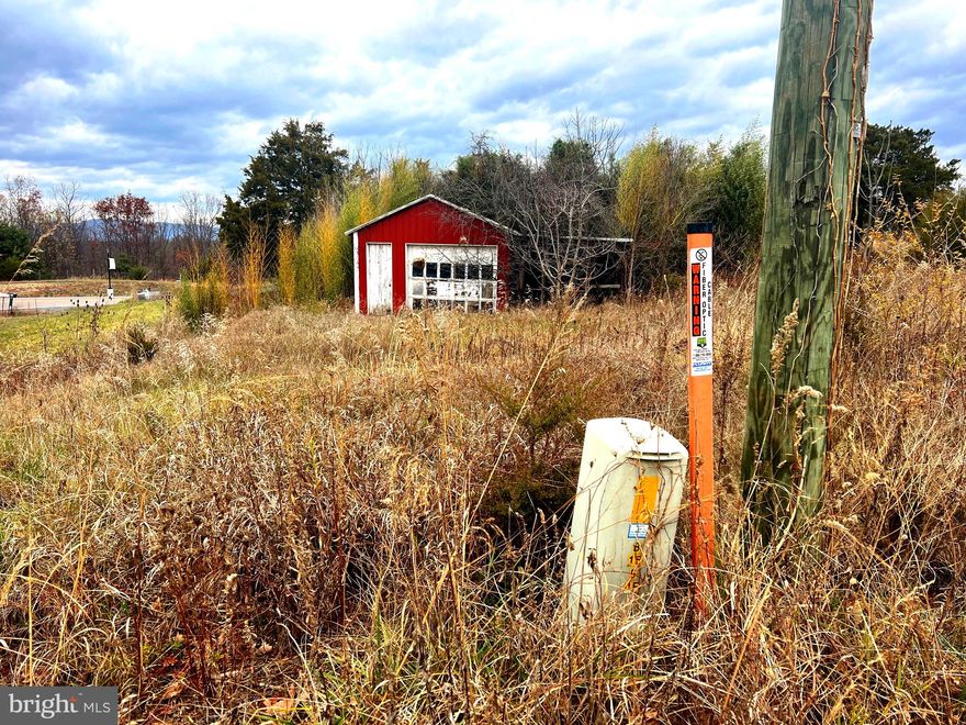 Unrestricted acreage beside college, at edge of town heading east off Corridor H on Eastern Drive! Views.
Easy access. Building/Barn on one of the parcels.