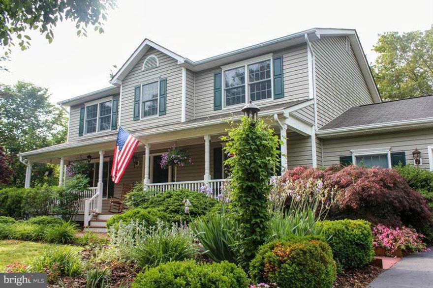 Beautiful colonial on a private 1.45 acre lot in Hollywood.  Kitchen w/granite counters, upgraded appliance package, tile backspash, Family rm off kitchen w/gas fireplace, sliders onto trex deck, formal din & liv rms, hardwood floors on 1st floor, new carpet, unfinished basement w/3 piece rough in & walk out.  Special financing incentives on this property through SIRVA's preferred lender.