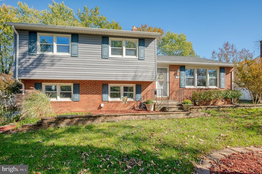 **************OFFERS DUE BY 5PM FRIDAY  NOVEMBER 3************* So much more than curb appeal! Impeccably landscaped partial brick multi level  home in attractive Waterford neighborhood is freshly painted throughout and move-in ready. Original hardwood floors, open floorplan, updated kitchen and lots of natural light greet you on the main level. Three bedrooms on upper level have hardwood flooring and ceiling fans. Primary bedroom has an en-suite bath and two closets.  Adjacent to the hall bath are two linen closets with lots of storage.  Side door opens to oversized laundry room/mud area with brand new luxury vinyl plank flooring and convenient half bath. Lower level also includes  newly carpeted family room with a  gas fireplace and opens to spacious sunroom.  Manicured back yard has brick patio, shed and several gardens. Finished basement is perfect for a  fitness or game room. Basement also features shop and utility area for storage.  Updates include newer roof, NEW HVAC and NEW  water heater, new electrical outlets, fans & more!  Solar panel is owned and will convey. Convenient to 695, Hampton Swim Club, Pine Ridge Golf Course, Loch Raven Reservoir, several schools, and shopping, restaurants, and entertainment along York Rd.