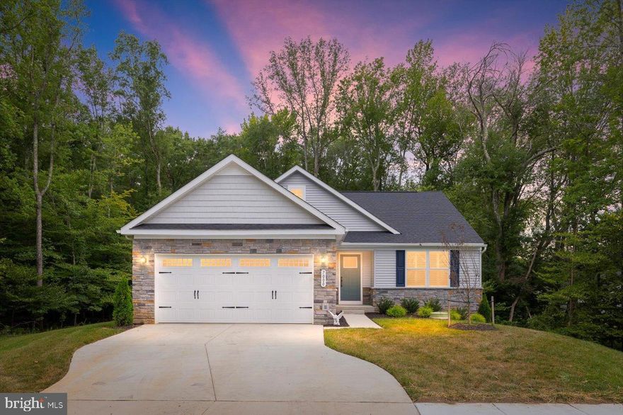 Nestled at the end of a street on one of the most PREMIUM and SECLUDED lots within the serene and vibrant community of Regency at Chancellorsville North, this exquisite ranch-style residence with a finished basement is designed for those seeking a luxurious yet comfortable lifestyle. With a thoughtful age requirement of 55 and over, this home offers an exclusive environment that fosters connection, tranquility, and active lifestyles from the pickle ball courts to the community pool. As you step inside, you are greeted by an inviting open-concept layout that seamlessly blends the kitchen and living areas, perfect for entertaining or enjoying quiet evenings at home. The heart of the home features upgraded countertops that exude elegance, complemented by high-end stainless steel appliances, including a built-in microwave, electric oven/range, dishwasher, and refrigerator. The spacious pantry ensures ample storage for all your culinary needs, while the combination kitchen/living space creates a warm atmosphere for gatherings. This residence boasts 3 entry level generously sized bedrooms, including a primary suite that offers a private retreat. The walk-in closet provides abundant space for your wardrobe, ensuring that everything is organized and easily accessible. The 2 other entry-level bedrooms add convenience, making it ideal for guests or as a personal office space. The partially finished walkout basement also has a bedroom with oversized closet and included with that downstairs is a full bathroom, this presents endless possibilities, whether you envision a cozy media room, a hobby space, or additional storage. Additional features of this home include ceiling fans for comfort, plantation shutters, main level laundry room, vinyl deck, an attached front-entry garage with space for two vehicles, and a beautifully landscaped lot of roughly 0.17 acres that enhances the overall curb appeal. Living in Regency at Chancellorsville North allows you to embrace a lifestyle of luxury and ease, with access to community amenities that promote an active and engaging lifestyle. Not to mention all of your shopping, entertainment, dining needs can almost completely be fulfilled  within a easy 5 minute drive. Experience the perfect blend of elegance and warmth in this stunning property, where every detail has been thoughtfully curated for your enjoyment and leisure.