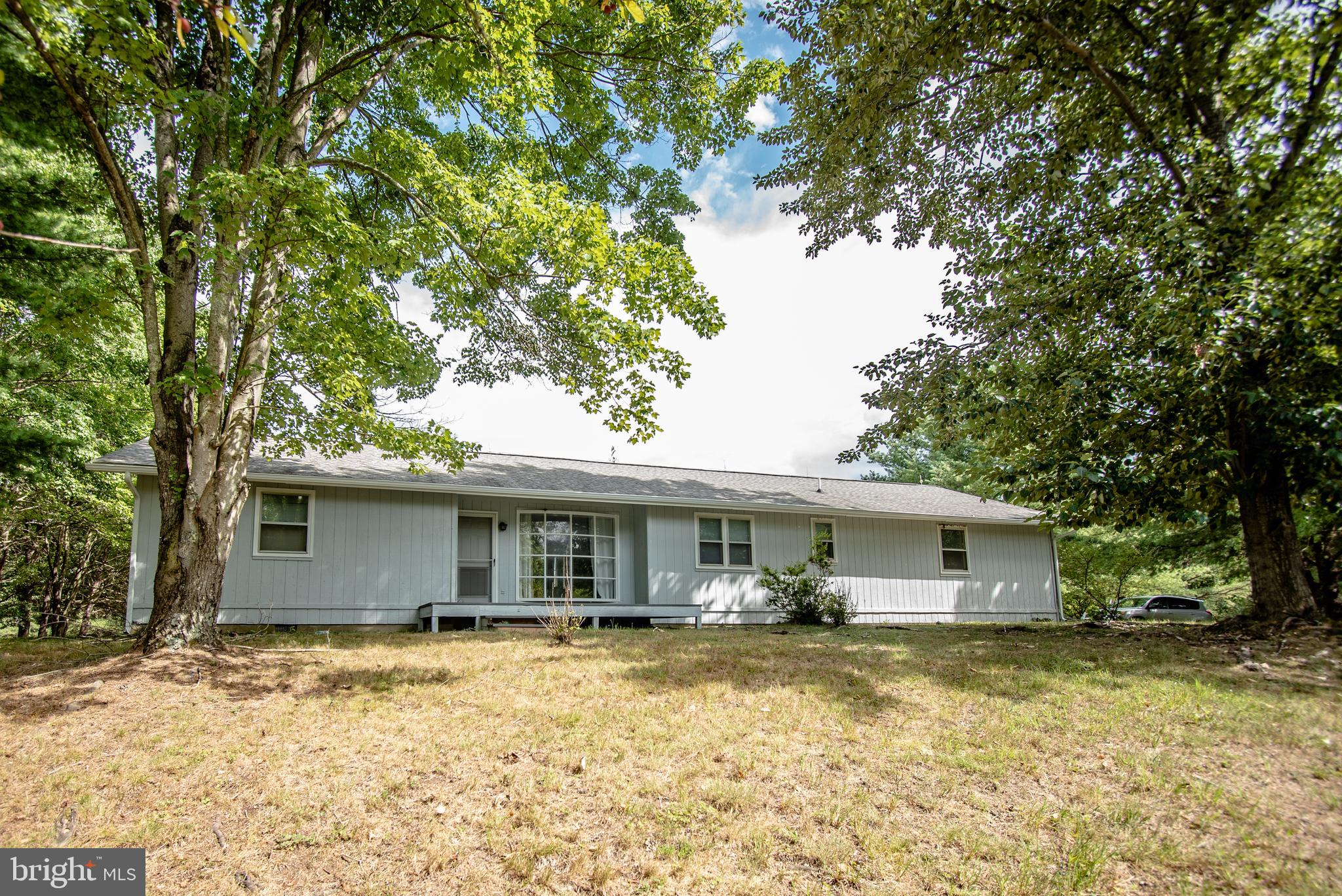If you are looking for a quiet country home. You may have found it in this lovely rancher on 2.21 acres of flat land. No HOA! 3 bedrooms and 2 full baths. Large owner’s suite and full bath. New decks on front and back, as well as new gutters. Large bonus room. You have your own private sauna room! Photos coming soon!