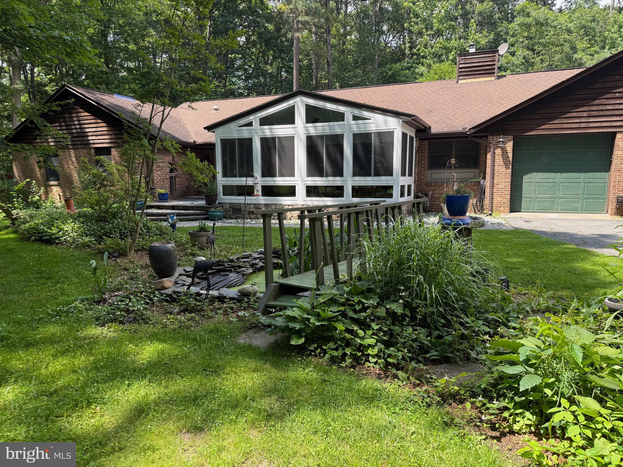 New Price and New Roof in the process of being replaced now!!
This is it! Location, acreage, and privacy can be yours in beautiful Centreville. Quality build, one level living, with 4 good sized bedrooms, 2.5 baths. 2 car attached garage and a 2 car detached garage for the hobby enthusiast. Enjoy your private oasis surrounded by beautiful trees, and the sounds of nature while you lounge by the pool or have a cook out on the oversized deck and end the evening watching the stars from your hot tub!
Stuck indoors? sit back and soak in all the nature from the beautiful new Sunroom. If you've got a green thumb, this is a gardner's dream! Beautiful hostas, azaleas, blackberries, and perennial gardens surround the home and property. And if you want to grow your own, the large vegetable garden is already set for next year's planting. The family will enjoy the spacious yard for any activity. Plenty of parking to bring your boat, RV (30amp RV plug outside), or keep chickens, goats, ducks, etc in your fenced-in area with a shed set up for animals. Recent Upgrades:
2 New pool Pumps 2025
New Sunroom 2023
New hot water Heater 2022
New Well Pump 2019
New HVAC 2019
This home is truly special due to its unique beauty, location, great schools, and private space for making your own memories. Come check it out!