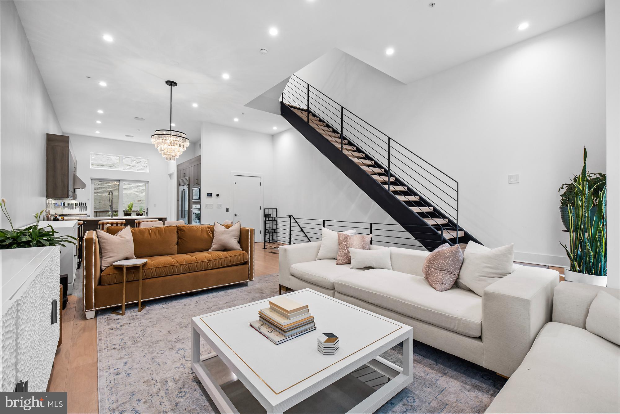 Look no further and make an appointment to see this designer home located in the Old City Community of Black Horse Alley on a cobblestone street and gated private driveway with 2 car garage. This open concept city living 6 level townhome boasts high ceilings and floor to ceiling windows has 4 bedrooms, 4 full baths and 2 half baths and an elevator. Enjoy a large kitchen with quartz countertops, wolf and sub zero appliances and plenty of cabinet space for storage. The comfortable size family room delivers plenty of natural light. Unwind in your own Sauna Room in the lower level entertainment space with a full bathroom and space can be used for gaming or movie nights. Make your way to upper levels and you will find 2 bedrooms with full baths and a 3rd Bedroom that is currently being used as a home office. All with a walk in closet space. The owners suite has its own floor and the bath has been recently renovated and features a soaking tub and a frameless shower with dual controls. A bonus space on the top level as an extra entertainment space with its 2 decks to enjoy the view of the Delaware River and city skyline. Walk to the many restaurants in the area and historical attractions. Easy access to major highways and bridges to New Jersey. Pack Your Bags!