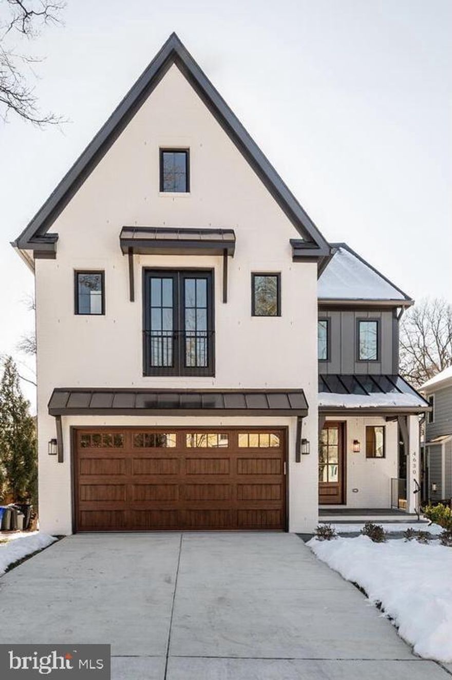 Located in the Woodlawn neighborhood - one mile from the Ballston Metro stop and the retail and restaurants of Ballston Quarter, this new home by Wormald/American Signature Properties is completed and ready for move in.  Special features include Bosch appliances, custom cabinetry, hardwood floors, eight-foot main level interior doors, two-car garage, five bedrooms and four and one-half bathrooms.  Located steps to Woodlawn Park this home is sited on a level lot with rear patio and backyard space for entertainment.  Backed by Wormald’s longstanding reputation – a family business with sixty years of building experience, attention to detail, and strong customer service warranty program.  Other lots and properties are available.