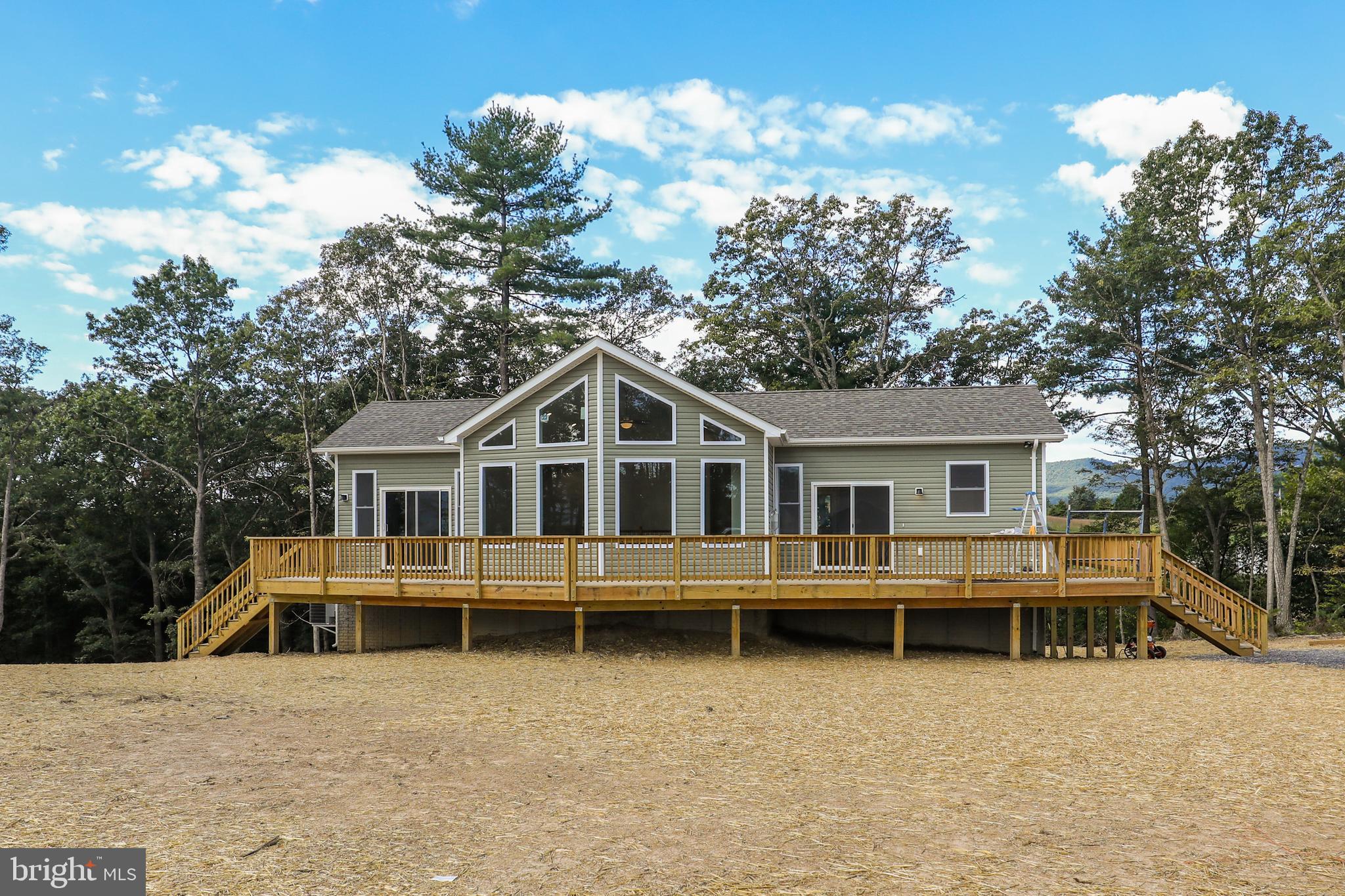To-Be-Built Riverfront Chalet on the Shenandoah – Luray, VA
Welcome to your dream getaway or ideal forever home on the banks of the scenic Shenandoah River. This to-be-built 1,300 sq ft chalet offers modern comfort and rustic charm, all just minutes from downtown Luray and the Blue Ridge Mountains.
Featuring soaring 9-foot ceilings, an open-concept layout, and expansive windows to take in the river views, this 3-bedroom, 2-bath home can be customized to suit your lifestyle. Whether you're looking for a peaceful primary residence, a short-term rental investment, or a vacation escape, this property fits the bill.
Customizable options include:
– Attached or detached garage
– Extended deck or screened-in porch
– Interior finishes and layout upgrades with additional sqft
– Add a second dwelling (guest house, studio, etc.)
_Add Basement
Enjoy kayaking, fishing, or simply relaxing from your private riverfront—this rare opportunity combines nature, luxury, and flexibility in one unbeatable package. Boat landing and many amenities near by.
Secure your spot now and personalize every detail to make it truly yours! Model Plan available to view offsite.
Buy this home with a regular loan. No need for a construction loan!