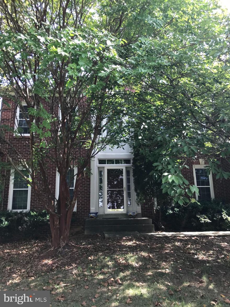 Beautiful Single Family Home with 4BR's and 2.5 BA's. Beautiful wood floors throughout the first floor. Kitchen with granite counters, FR with FP and French doors leading to a Hugh deck overlooking back yard and trees. Large DR, LR and Den grace this level also. Grand Master BR with cathedral ceiling, sitting area and walk in closet. Master BA has Jacuzzi tub and separate shower. 3 other bedrooms on this level also.