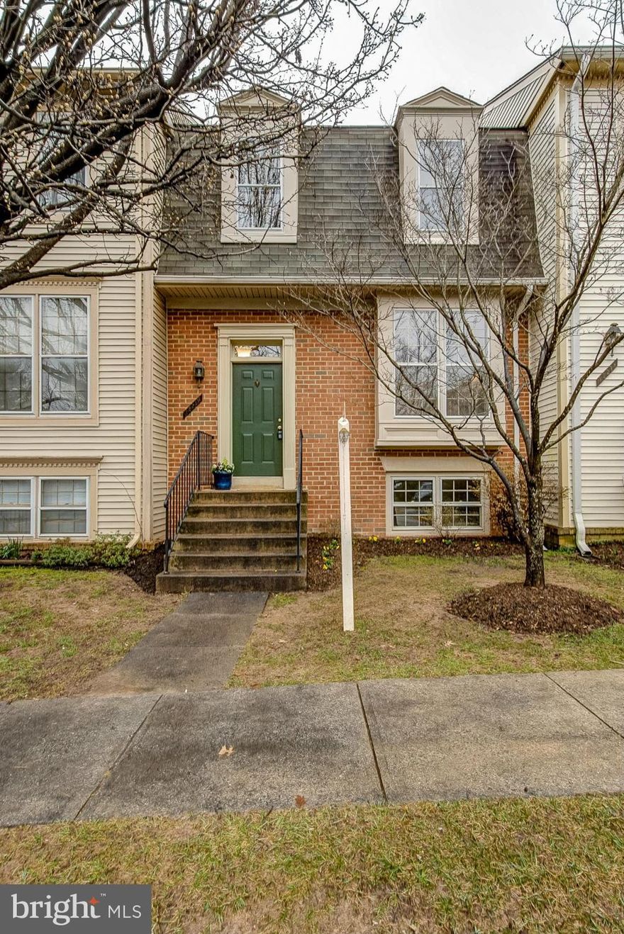 Spacious UPDATED four bedroom townhome in sought after FAIR RIDGE*Gleaming hardwood flooring on main level, NEWLY INSTALLED wall to wall carpeting*FRESH PAINT,*granite counters*stainless steel appliances*Fully Finished Walkout lower level with recreation room with wood burning fireplace*full bath*bedroom and storage* Vaulted Ceilings in Bedrooms* Large Deck* Fenced Back Yard*MOVE IN READY!!!