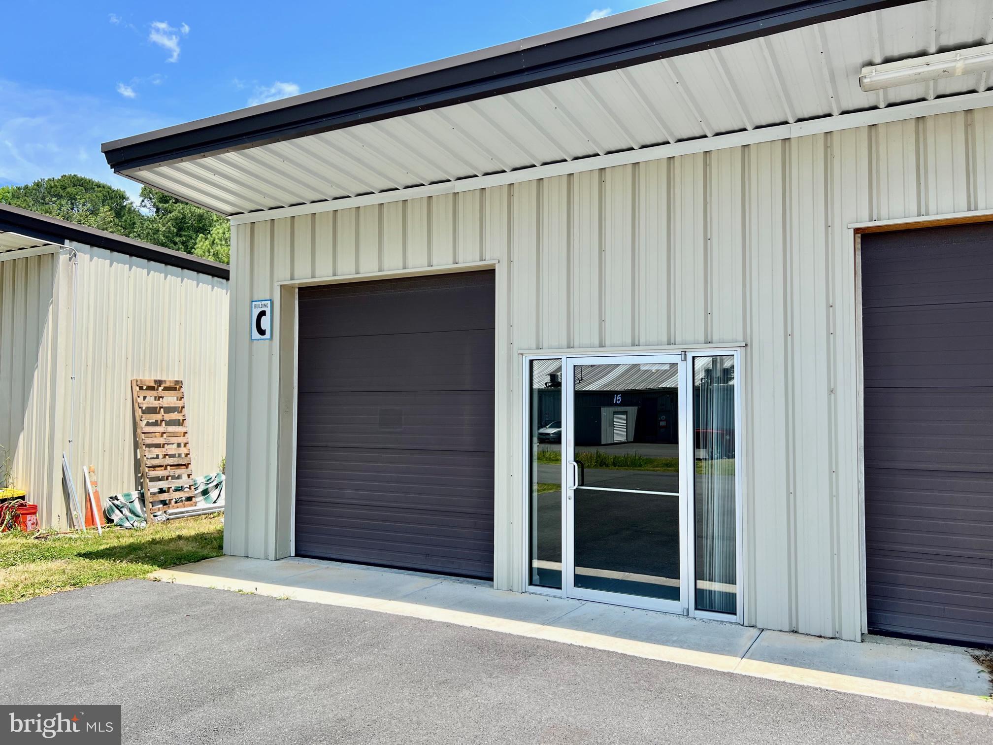Great rare opportunity to own a warehouse unit in Sunset Square. Roll-up garage door, painted concrete slab floor, glass entrance and rear access door. Central HVAC (AC is electric; Heating is gas.) Large handicap accessible half bath with ceramic tile floor. Well water w/public sewer and dumpster service. Clusterbox available. Awesome West OC location, with ease of access to 611 and Route 50. Very low condo dues at $200/qtr. Annual insurance payment of $250