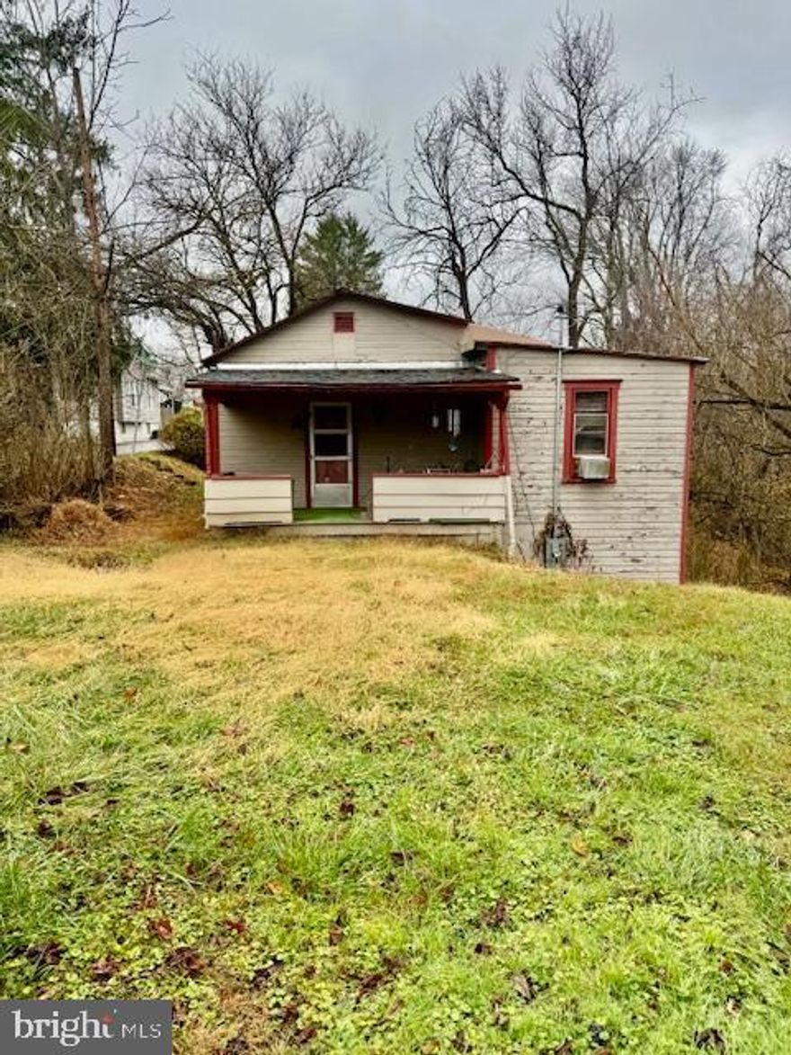 Home is being sold AS IS. Everything in house goes with property. New Metal Roof. Call today for a showing!
