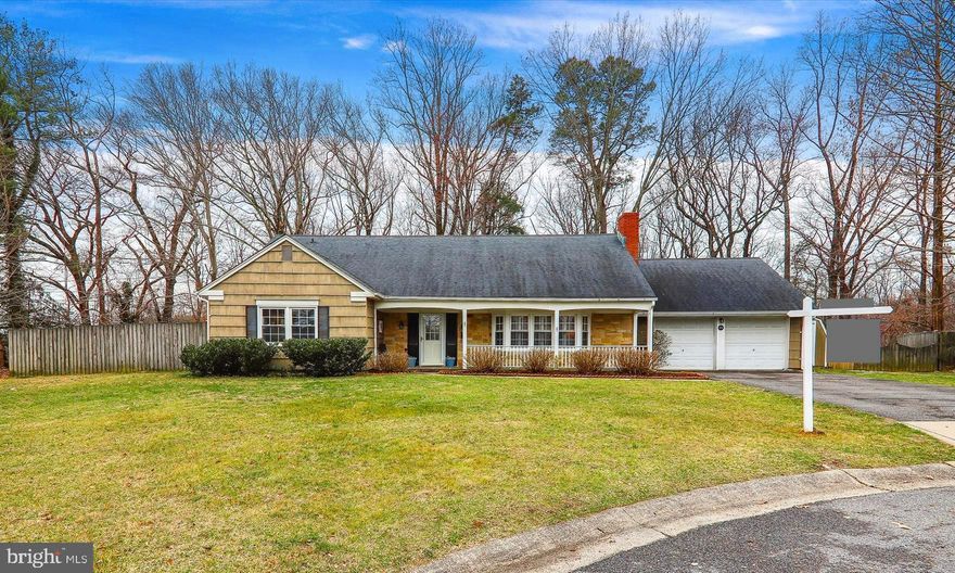 This GORGEOUS, updated sought-after Country Clubber sits on a remarkable and private 1.03 ACRE property located at the back of a cul-de-sac!  That's right...AN ACRE...that backs to trees...on a cul-de-sac! So you get all of the benefits of suburban living  in the front with all of the privacy of country living in the back!  Amazing!  Incredible, GORGEOUS kitchen remodel with huge island, quartz countertops and high-end cabinetry!  You will fall in LOVE.  Main-Level primary suite with an en-suite bathroom and ample closet space.  Additional bedroom and bath on the main level as well as a private office with separate entrance off the kitchen. Huge Living Room with plantation shutters and mounted TV where everyone can gather around.  Newer LVF throughout main level.  Two HUGE bedrooms and third bathroom located upstairs with new carpet and paint.  This home is turn-key and ready for you.  Don't miss out!!