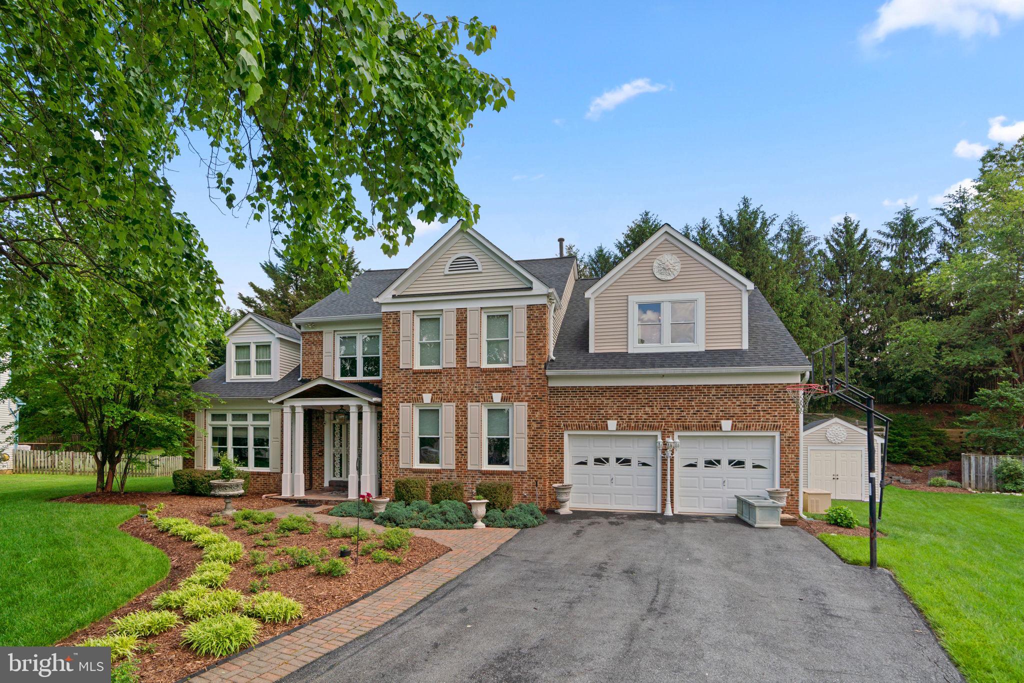 One step into this incredible home, and you will feel right at home! Featuring 4 bedrooms and 3.5 bathrooms to go along with over 5,300 square feet, this home has it all. An open floor plan on the main level, this home is both a place to envision your family and an entertainer's dream. As you enter the inviting foyer, your dining room and sitting room is to your left. A study is on your right with beautiful built-ins, featuring a two-tier file cabinet and closet. The spacious kitchen is straight ahead and features an island, granite countertops, and an abundance of storage, and as you continue your way into the great room, you will find an incredible stone fireplace. The deck with grill is accessible and leads to a gated backyard. In the great room you will find an additional sink, oven and even more cabinets await! This large room can include additional family room seating/more room for dining or use your imagination. There is an additional bonus room (playroom/nap room/bedroom) off the great room that features two large cabinets above and four storage units below the large window. Upstairs includes 4 spacious bedrooms and 2 full bathrooms, (jacuzzi in master bath), with the showstopping primary suite and ensuite as the centerpiece. Downstairs features a huge rec room (over 1,500 square feet) with a pool table that conveys, a wet bar, a full bathroom with a sauna, and a theater room with seats that convey which you you have to see. The cork floor is hypoallergenic. Walk-up access to the backyard protected by a portico. The yard is wonderfully landscaped. The home has been waterproofed. This type of home doesn't come available often, so call us today!