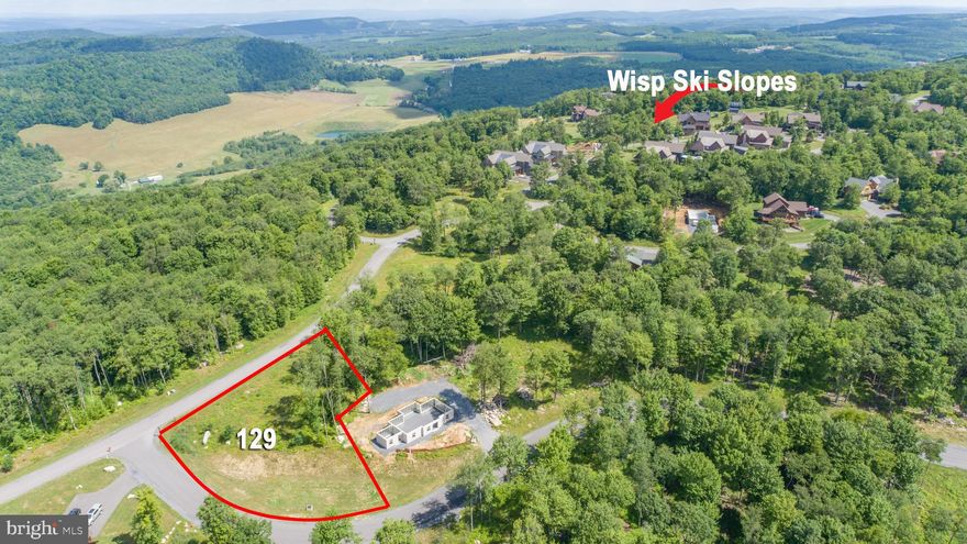 Mountain View Building Site! This premier mountaintop lot in the gated community of North Camp has that "WOW" factor that you have been searching to find, for that spectacular dream home that you have been waiting to build! Take in the breathtaking views of a scenic vista that will provide new beauty as the seasons change! It is really true that you "can see for miles and miles"! The building process will be easily facilitated with level ground and minimal clearing needed to get underway.  Public utility hook-ups are available here for water and sewer.  Envision your home on this corner lot and being just steps away from all activities on the Wisp mountain top, including: Skiing, the incredible state parks nearby, challenging golf courses, and Deep Creek Lake.   Beautiful Mountain Views! Grab your plans and get started now!