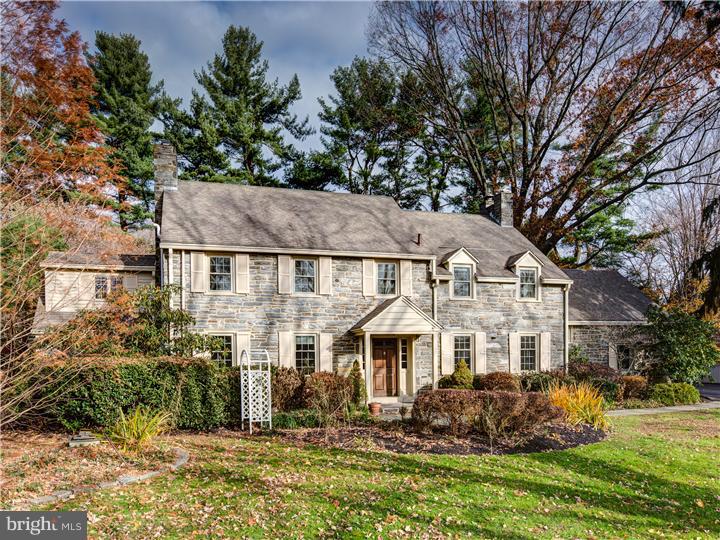 Refined Elegance in the Heart of the Main Line! This outstanding stone Colonial home was built in 1937 yet significantly updated in 2013. Surrounded by Arboretum quality landscape, this classic home has been thoughtfully expanded and meticulously updated to enjoy all the charm, character, and architectural qualities found from yesteryear combined with all the modern amenities and convenience of today. With over 5700 square feet of living space, this home offers magnificent entertaining spaces seamlessly joined to intimate family quarters. The Brand new kitchen, built by Gardner Fox was just finished with all your chef's requirements. The new laundry/mud room with granite is large enough to keep all 5 bedroom residents looking their best. The open floor plan in the family center brings the busiest of people together yet there are private sanctuaries for personal enrichment. Most of the features are too numerous to mention, however some of the highlights are hardwood floors,new windows,quartzite countertops,security system,deer fence,landscape lighting,built in gas grille,3 fireplaces,3 zone HVAC, and significant moldings. The flexible floor plan has 2 master suites, one up and one down. The location speaks for itself sitting high on a hill with convenience to transportation, library, parks, playground, shopping, and schools.