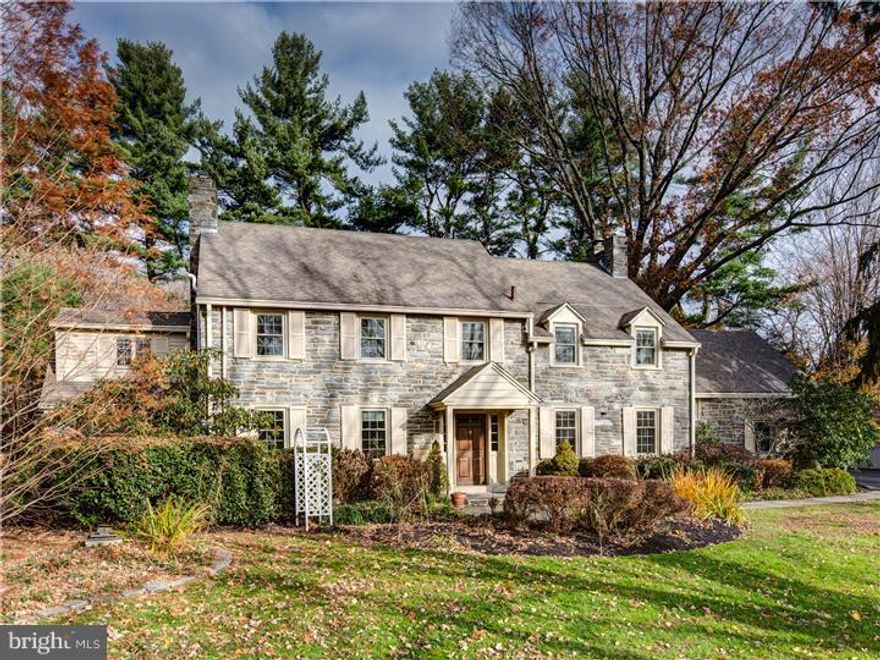Refined Elegance in the Heart of the Main Line! This outstanding stone Colonial home was built in 1937 yet significantly updated in 2013. Surrounded by Arboretum quality landscape, this classic home has been thoughtfully expanded and meticulously updated to enjoy all the charm, character, and architectural qualities found from yesteryear combined with all the modern amenities and convenience of today.  With over 5700 square feet of living space, this home offers magnificent entertaining spaces seamlessly joined to intimate family quarters. The Brand new kitchen, built by Gardner Fox was just finished with all your chef's requirements.  The new laundry/mud room with granite is large enough to keep all 5 bedroom residents looking their best. The open floor plan in the family center brings the busiest of people together yet there are private sanctuaries for personal enrichment.  Most of the features are too numerous to mention, however some of the highlights are hardwood floors,new windows,quartzite countertops,security system,deer fence,landscape lighting,built in gas grille,3 fireplaces,3 zone HVAC, and significant moldings.  The flexible floor plan has 2 master suites, one up and one down.  The location speaks for itself sitting high on a hill with convenience to transportation, library, parks, playground, shopping, and schools.