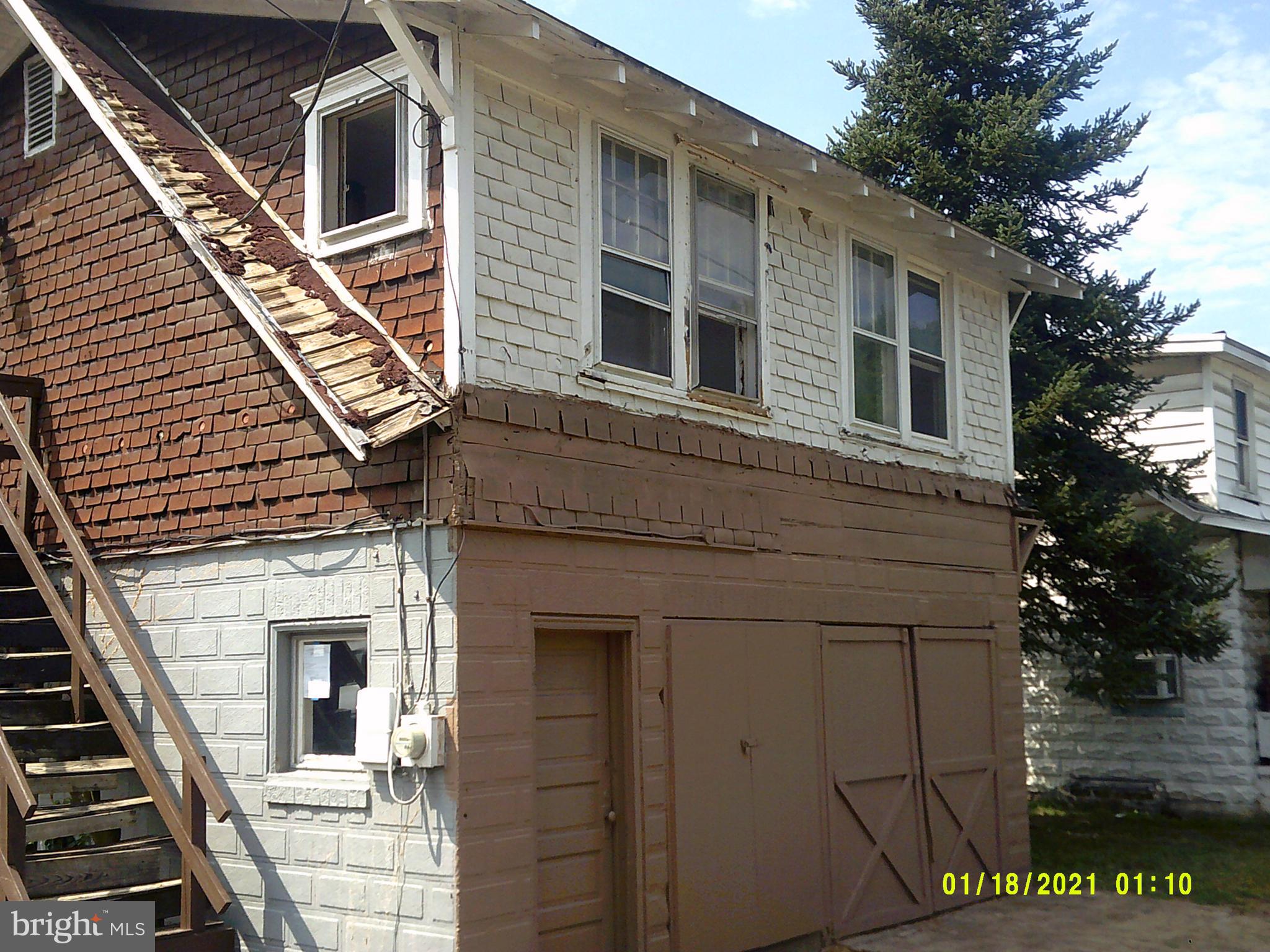 2-UNIT THAT HAS STARTED RENOVATION, OWNER IS WORKING ON THE PAINTING AND IS GOING TO RE-CARPET EACH UNIT. BOTH ARE ONE BEDROOM UNITS ONE UP/DOWN. PROPERTY IS CURRENTLY VACANT AND ELECTRICITY IS TURNED OF. PLEASE SHOW DURING THE DAY. ALSO WORKING ON THE STAIRS TO THE SECOND FLOOR, PLEASE BE VERY CAREFULL ON THE OUTSIDE STEPS LEADING TO SECOND FLOOR. BOARDS ARE LOOSE UNTIL THEY GET CORRECTED. THERE IS A SECOND STAIRWAY INSIDE. ONLY ONE ELECTRIC METER CURRENTLY.
