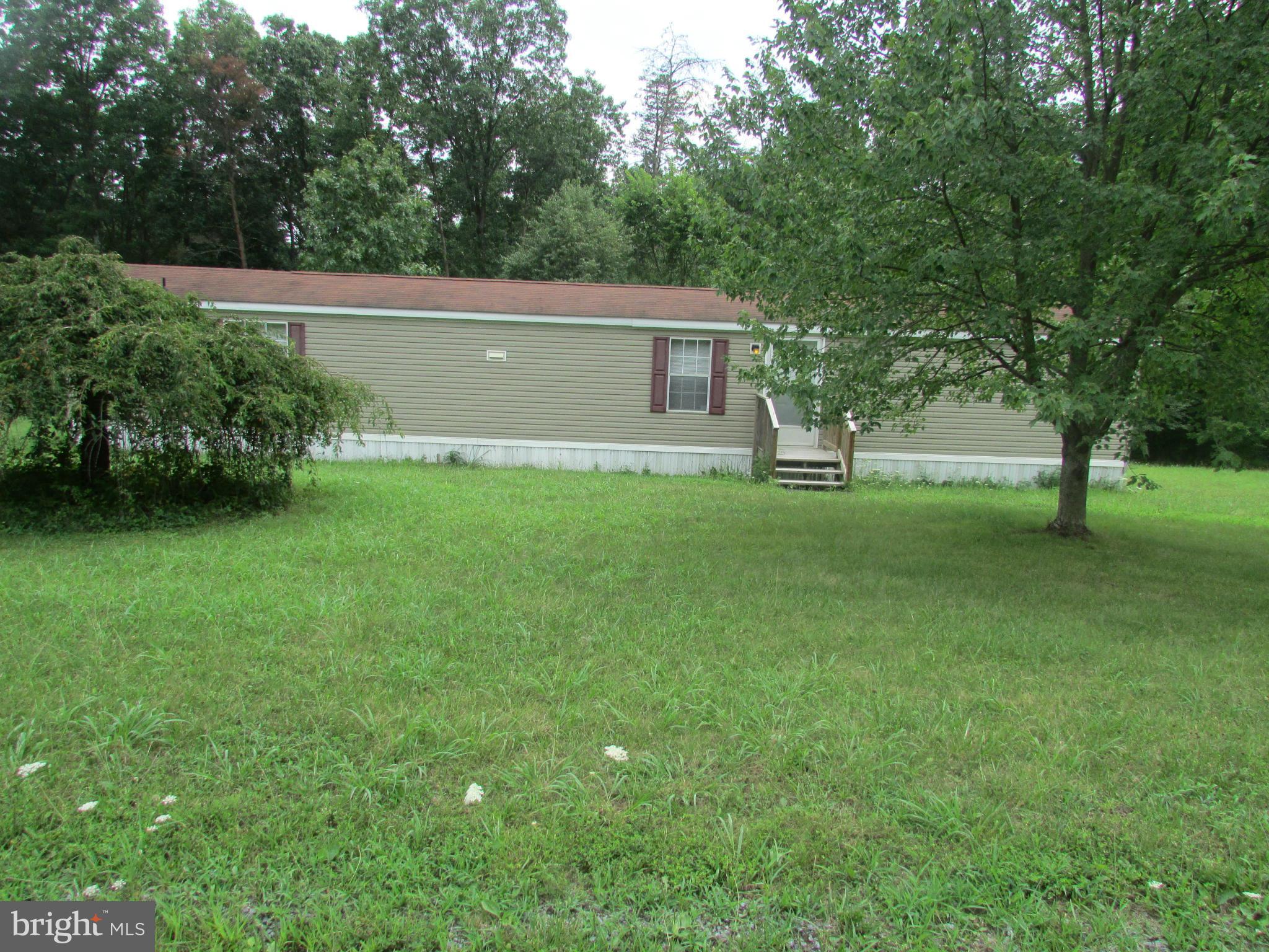 An extremely clean 2007 Eagle River Mobile home located on 5 wooded acres. 2 bedroom, 2 bath, living room and kitchen. Ready to move in.