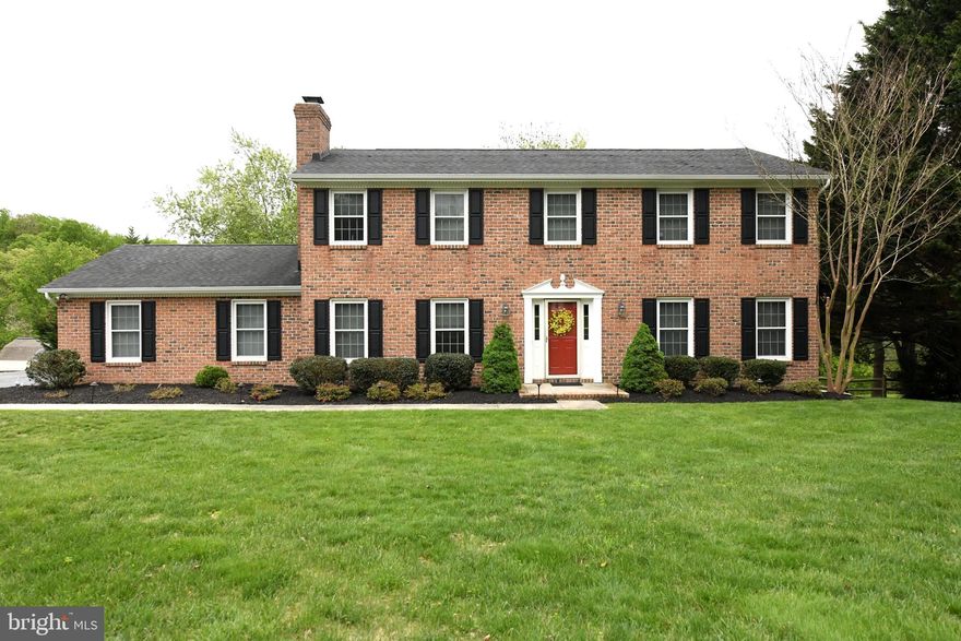 Welcome to 305 Rolling Knoll Drive, a classic brick, four bedroom 2.5 bath home, nestled on 1.10 acre in Bel Air's sought after community of Glenwood Country Club Park.   Both Kitchen and dining room flow naturally to the deck, making indoor-outdoor living effortless.  A nature lovers dream! You will love enjoying your coffee/tea or perhaps your evening beverage out on your expansive deck while entertaining guests or just relaxing with a good book.   For those who love to entertain, the home offers a gracious dining room for more formal occasions, and a spacious family room, complete with a cozy fireplace with large brick hearth perfect for casual gatherings. Head upstairs to the second level, where you will find four bedrooms, including a spacious primary suite with a large bathroom and generous sized closets. 
The fully finished lower level is a spectacular crowd-pleaser, featuring a walk-out to the back yard, abundant natural light, Dry Sauna, 4 persons with LED lights, Inlaid stone wet bar, pool table, foosball, weight room, storage room. Ideal for gatherings, recreation, or additional space for relaxing.
Outside, the serene backyard is an oasis, with an expansive deck that overlooks beautiful views. The property offers 1.10 acres, has a stream, a fire pit, and is an ideal space for relaxation and outdoor enjoyment. 
Also included is a very large permitted custom built shed, 10' X18' with 12 foot ceilings, loft, windows. and a workbench.
This is a home designed for comfort, connection, and carefree outdoor summer living. 

Located in a fantastic neighborhood just minutes from Bel Air and I-95, you’ll enjoy an easy commute to Baltimore or APG. Don’t miss the opportunity to call this exceptional home yours!