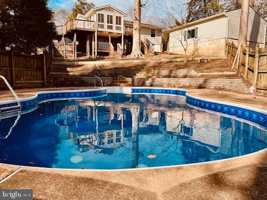 Welcome to 7012 Stanley Road! This 3 bedroom/1 bath single-family home is nestled on 1.1 acres and offers the perfect blend of comfort, convenience, and outdoor living.  Many updates have already been made on this move-in ready home that's just waiting for you to add your personal touches.

Step inside to a warm and inviting layout featuring vinyl plank flooring, ceramic tile, and new carpet! The heart of the home centers around the eat-in kitchen with stainless steel appliances, new quartz countertop, and a newly added peninsula with granite countertop.  

Enjoy year-round living in your spacious sunroom with views of the in-ground pool and natural landscape. Ideal for everyday living, entertaining, or just relaxing.

Outside, this property offers the privacy of over an acre with the convenience of nearby amenities.  Imagine cooling off in your in-ground pool this summer or hosting a BBQ on your large deck. While touring this home, don't forget to check out the expansive detached garage, perfect for vehicles, hobbies, or extra storage.

Notable features include:

- Central Heat & Air
- Newer 40 year Architectural Roof (installed 2019)
- Conveniently Located (15 minutes Fredericksburg, 20 minutes Dahlgren)
- New Pool Liner