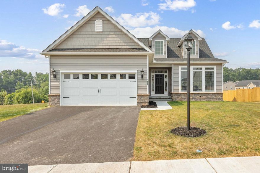 Welcome to Cumberland Village!  This is the Nicole Model. Photos may show additional options (SIMILAR PHOTOS) This Nicole rancher features 3 bedrooms, 2 full baths, 2 car garage with a full basement. . Step inside and you will find 9ft ceilings that is open from kitchen to the great room. LVP flooring throughout foyer, kitchen, hallways, and great room making cleaning a breeze! Kitchen ,featuring 36" cabinets with crown molding and granite countertops, has a kitchen island  perfect for cooking and gatherings and large pantry. Primary bedroom is very spacious and has a large walk-in closet plus a custom tiled bath with walk in shower and double sinks! This is a to be built listing.