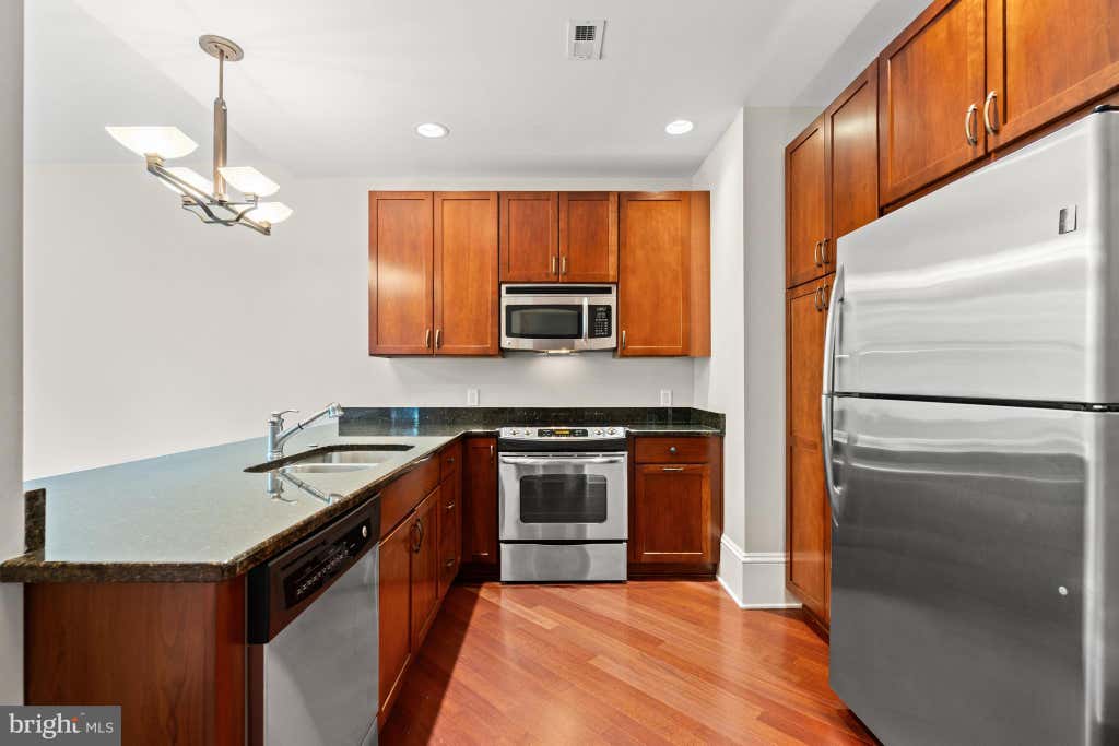Photo of 9610 Dewitt Drive #SH203, SILVER SPRING, MD 20910 (MLS # MDMC2251048)
