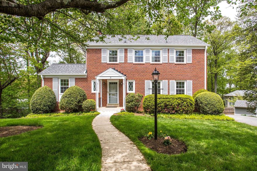 Fantastic 4BR/2.5BA Gruver Cooley built home on cul-de-sac lot w/ room for attached garage! Slate entrance! Gleaming hardwoods throughout! Remodeled kitchen w/ new appliances! Family room w/ wood burning fireplace! Office/bedroom on main floor! Master suite w/ shower! Large secondary BRs! Partially finished walkout basement w/ wood burning fireplace, half bath & potential 5th BR! Flagstone terrace patio!  New roof! New foam-filled frame double strength windows! New electrical LED fixtures! New sewer line!