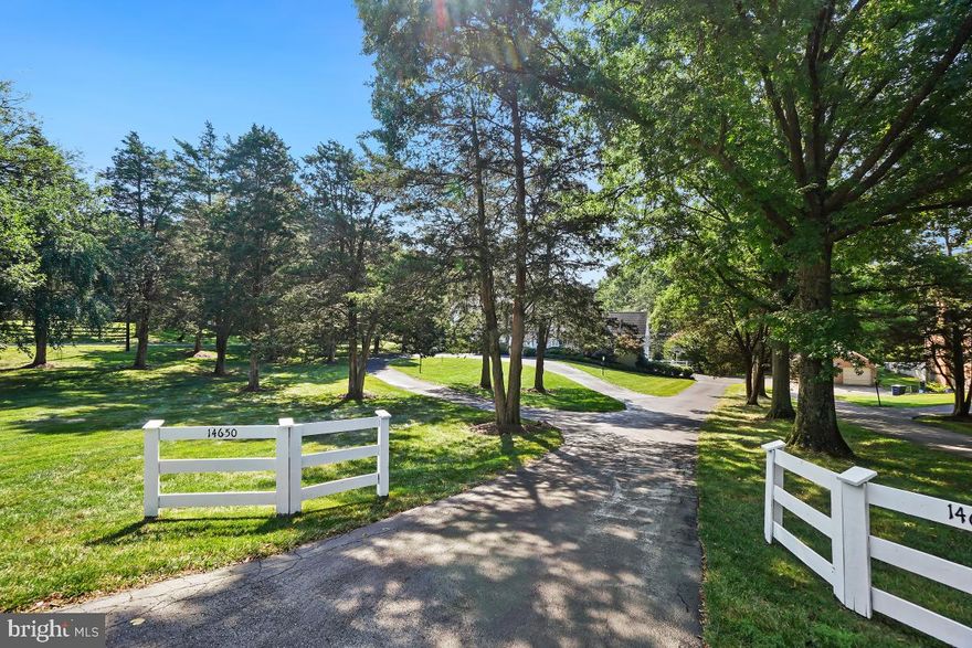 Love to entertain?  Whether indoors or outdoors, this stately 6 bedroom, 4.5 bath brick colonial on 2.75 manicured acres is just the place. A  circular  driveway and a gracious “Southern-style” portico greet arrivals. Flooded with light, the main level boasts a large living room, a banquet-sized dining room, an updated table-space kitchen exiting to the huge deck, a warm family room, a convenient office, a powder room and a glorious sunroom. The entire back of the house overlooks the county-club backyard. Upstairs, the enormous primary bedroom suite showcases a sitting area, bedroom, walk-in closet and renovated bath with a separate tub and shower. Four more bedrooms and two more bathrooms complete this floor.  Downstairs, the walk-out lower level includes a bedroom, full bath and a spacious recreation room. Drinks on the deck,  a cookout on the patio, a dip in the  pool or a quick match on the tennis court are just a few of the possibilities for outdoor fun. Hardwood floors on the main and upper levels, a generator and a  large storage shed further enhance this property Don’t miss this rare opportunity for easy—yet sophisticated—living.