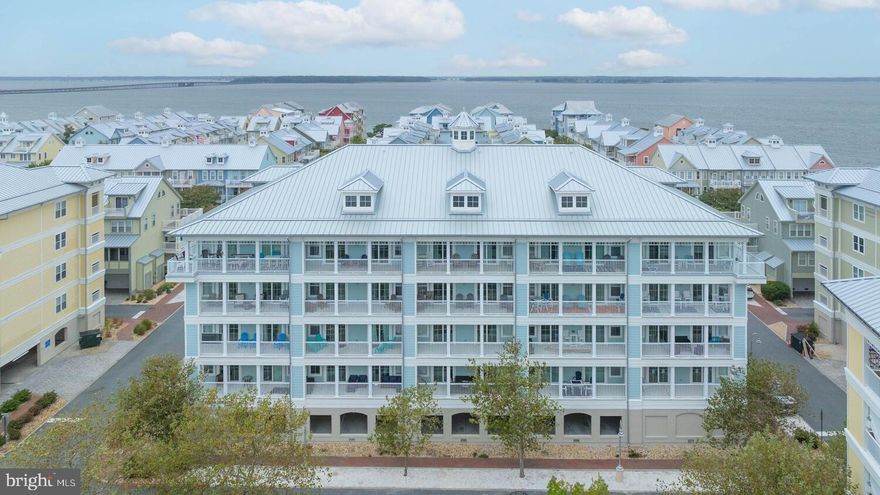 Furnished and turn-key, this 3 Bedroom / 2 Bath condo is located in an amenity-rich community offering true resort-style living! Community features include a 24 hour secure entrance, private beach area on the Bay, sparkling resort-style pool, onsite market, café & restaurant, and a beautiful clubhouse with Fitness Center. Outdoor enthusiasts will love the crabbing and fishing pier, boat slip marina, and easy walk to the ocean and nearby restaurants. Inside, the unit features upgraded LVP flooring throughout, updated stainless steel appliances, and a versatile guest bedroom with Murphy bed that can double as a home office. The owner’s suite includes a spacious walk-in closet and a recently renovated bath. Offered fully furnished and turn-key, this property also presents excellent rental potential for investors. Assigned, covered parking and main level storage as well! Don’t miss this opportunity to own in one of the area’s most sought-after communities, perfectly blending coastal convenience with first-class amenities!