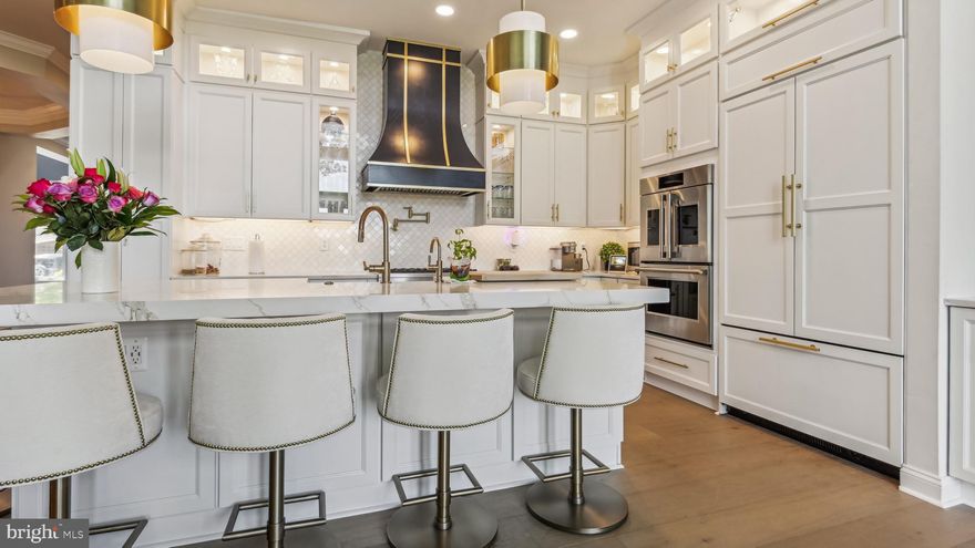 Spectacular Potomac River views from the completely renovated 6000 square foot townhouse located on the bluffs of River Creek Club, a gated golf course community situated at the confluence of the Potomac River and Goose Creek. Walls were removed and steel beams installed to create an open floor plan.  The kitchen was built to the highest standards with quartz counters, premium cabinetry, GE Monogram appliances, Steaming oven, pot filler over the range, custom built range hood.  Check out the flooring on the main and upper level!  The loft level adds addition space as well as views.  All bathrooms have been renovated.  The Primary Bathroom has a  spa like feel with a freestanding soaking tub.  The basement is set for entertaining with premium pool table, shuffleboard table, hockey table, and gym all conveying.  Short stroll to the Clubhouse for dining, Benjamins Tavern, swimming pools, tennis, and fitness center.  You can launch and stow your kayak from the dock at Confluence Park, near the tot lot.  **New feature of River Creek is the neighborhood farm, where you can select a plot to grow your favorite fruits and veggies.  This home is River Creek living at its best.