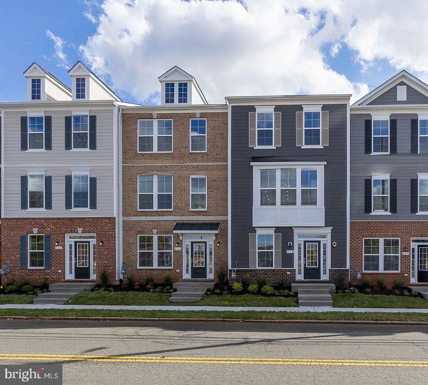 Discover Mary’s Landing, a new construction townhome community in the heart of Fredericksburg. These modern three-level homes with two-car garages combine style, space, and low-maintenance living just minutes from downtown shops, dining, and the Rappahannock River. Step inside the Upton on the lower level, where a welcoming recreation room greets you from either the front entry or the rear two-car garage. On the main level, the Upton shines with an open-concept design. The spacious family room provides plenty of room for relaxation and entertaining, with the option to add a cozy fireplace as a focal point. The adjacent kitchen is the true centerpiece, featuring a large island, ample counter space, and a dedicated dining space. Extend your living space outdoors with the optional sliding glass door and rear deck—perfect for morning coffee or evening gatherings. Upstairs, the Upton continues to impress with three bedrooms, two full bathrooms, and convenient bedroom-level laundry. Two secondary bedrooms share a hall bath, while the private primary suite offers a walk-in closet and a luxurious bathroom complete with dual sinks and a walk-in shower. The Upton is more than a townhome—it’s a home designed for modern living, offering the flexibility to adapt to your lifestyle today and for years to come. Enjoy historic charm, outdoor recreation, and convenient access to I-95, Route 1, and the VRE—making commuting simple and weekends full of possibilities.