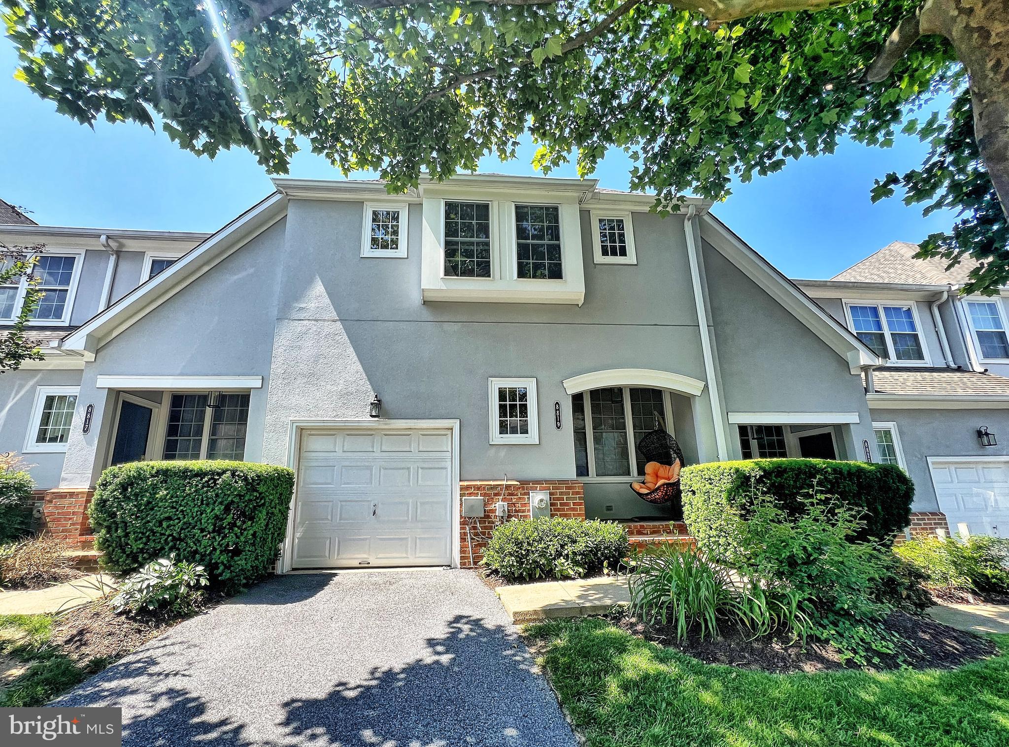 Beautifully 3 brm 3.5 bath townhome + den w/ open and bright floor plan in sought after Grey Rock community. Featuring nice open kitchen w/SS appliances and granite, HW floors throughout the main level. Upgraded bathrooms with masterful tile work and jet shower. Nice size bedrooms with cathedral ceilings. Fully finished walk-out basement with a full bath, office, and sauna. Nice deck overlooking a charming back yard. Enjoy this immaculately manicured gated community with pool, putting green, and much more. MUST SEE!