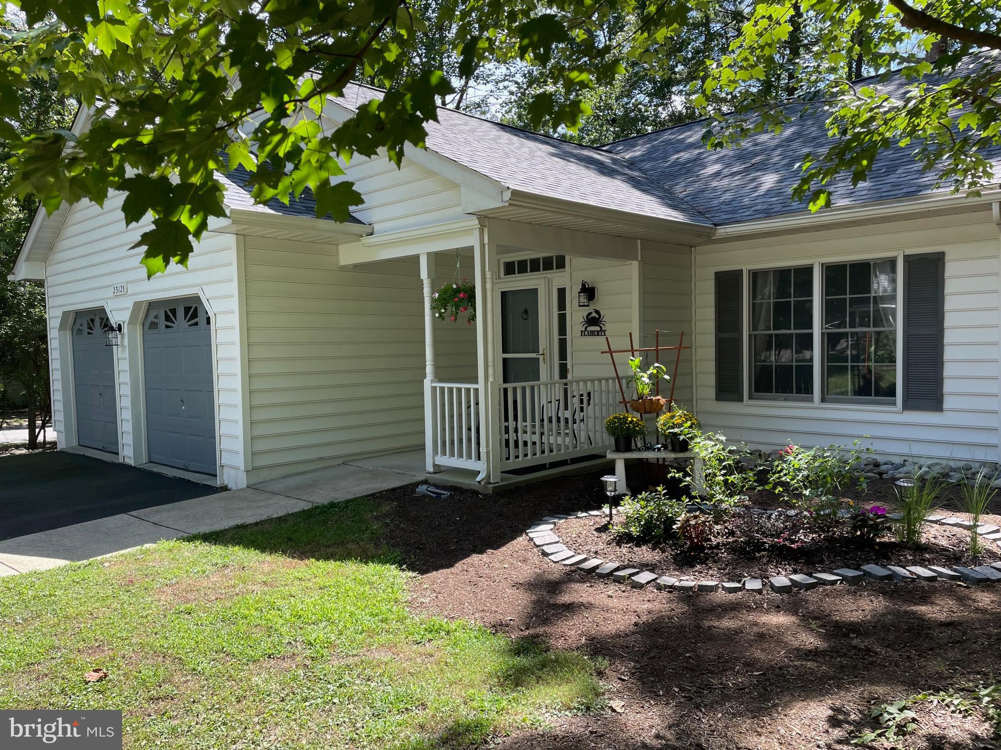Coming soon with more photos coming soon too. This is a lovely home on a corner lot with 2 car garage and paved drive. Covered front porch and beautiful patio out back. Trees trimmed and landscaped so very little to mow to maintain it. Open floor plan inside with formal living area and dining area open to the kitchen and den/sun room area. Tons of light as it has extra windows. Kitchen has large pantry and laundry closet for extra storage. Owner willing to give $5000 towards new counter tops or decorator allowance for you to use. Come see it today and make it your home in time for fall and campfire dinners by the fire pit.