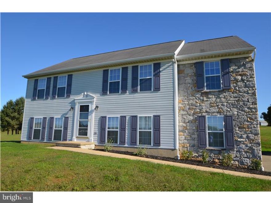 "IMMACULATE CONDITION AND METICULOSLY MAINTAINED" is this 3 bedroom and 2 full bath Bi-Level home situated on a one acre Corner Lot with fantastic views of local farmland. On the main level you'll find 3 spacious bedrooms, full bath, living room, dining room with new Pella sliders leading out to a 12x12 maintenance free Trex deck. Eat in Kitchen with Oak Cabinetry.  The lower level offers a generous size family room with pellet stove for supplemental heat, laundry, full bath, 12x12 screened patio perfect for entertaining and an oversized two car garage. Schedule you're showing today to see this Great Home, in a Great Location and Reasonably Priced.