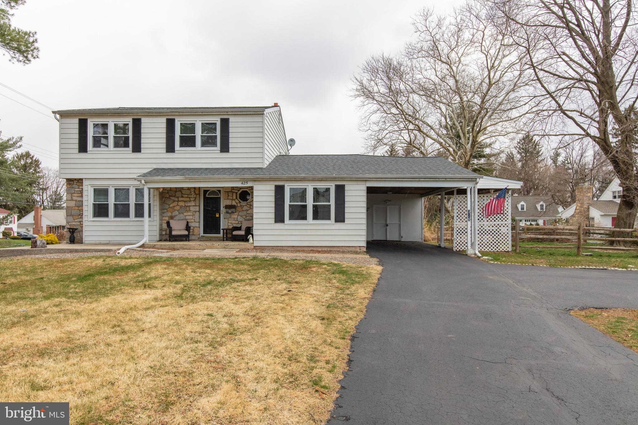 Showings Begin Thursday March 31st! Welcome to 425 Norriton Drive...a charming 2 Story Colonial nestled on a corner lot in the heart of East Norriton. So many upgrades await your visit. NEW ROOF Jan. 2022. New electrical panel installed 2018, whole house surge protector added Feb. 2022. Upstairs hallway rugs and luxury vinyl flooring installed in bedrooms November 2021. “Dogwatch” premium invisible fence installed around entire perimeter March 2019. Side yard fencing installed October 2019. Attic steps added March 2022. Light fixtures in kitchen and dining room, shutters, dishwasher garbage disposal and stove all new within the last couple of years. The foyer welcomes you with Hardwood Flooring and Recessed Lighting that flow thru the formal Living Room, Dining Room, and Kitchen. You'll love the Cabinet and Counter space in this Kitchen which features Stainless Steel Appliances, Granite Counters with Tile Backsplash, and Center Island with Pendant Lighting. Large Family Room with recessed lighting and a gas fireplace/stove. Mud Room with Laundry and updated Powder Room that leads to the Extra Large resealed Driveway and Carport. The Second Floor offers 4 Generously Sized Bedrooms, each with ample closet space and ceiling fans as well as an updated Hall Bath with Tiled Shower. Full Basement is huge and just begging to be finished, or great for everything you can’t throw away. There is a built-in shed under the carport which makes a great little workshop. Great property with mature trees and extra off-street parking. Quiet side street and easy access to major highways, shopping, dining, famed Norristown Farm Park and Einstein Hospital. Make your appointment today!