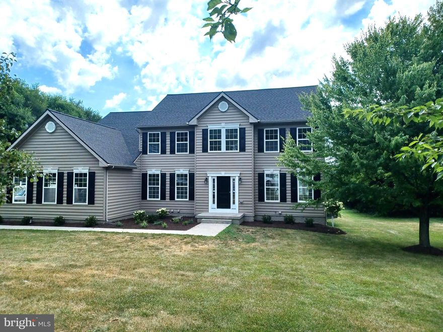 Beautifully renovated from top to bottom.  Enjoy the abundance of light and bright space in this open floor plan.  LVP throughout the main level and Primary Bedroom.  The kitchen has an abundance of work space with the expansive countertops, coffee bar and kitchen island with room for seating.  The quartz countertops complete the look on the 2 tone kitchen cabinets and stainless appliances.   There is a laundry room on the main level with sink and a second hook up in the finished basement.  The kitchen is open to a morning room with tons of windows and the family room, both having access to the new 14 X 16 composite deck with vinyl rails.  Formal dining has bay window that opens to the living room.  Office features french doors for privacy.  The foyer opens to a gorgeous staircase with metal and wood rails as well at LVP treads and risers.  Huge master suite has LVP flooring as well as the large walk in closet.  The primary bath features a free standing tub, oversized tiled shower with glass enclosure, double bowl sinks and tiled flooring.  3 Additional large bedrooms and a shared bath with tiled tub surround and flooring.  The walk up basement is finished with over 1,000 sq ft of additional living space and a full bath.  3 Car garage, drywalled and prime painted with insulated garage doors.  Roof and siding new within the last 3 years.  I've added some sneak peak photos showing work in progress, professional photos soon!